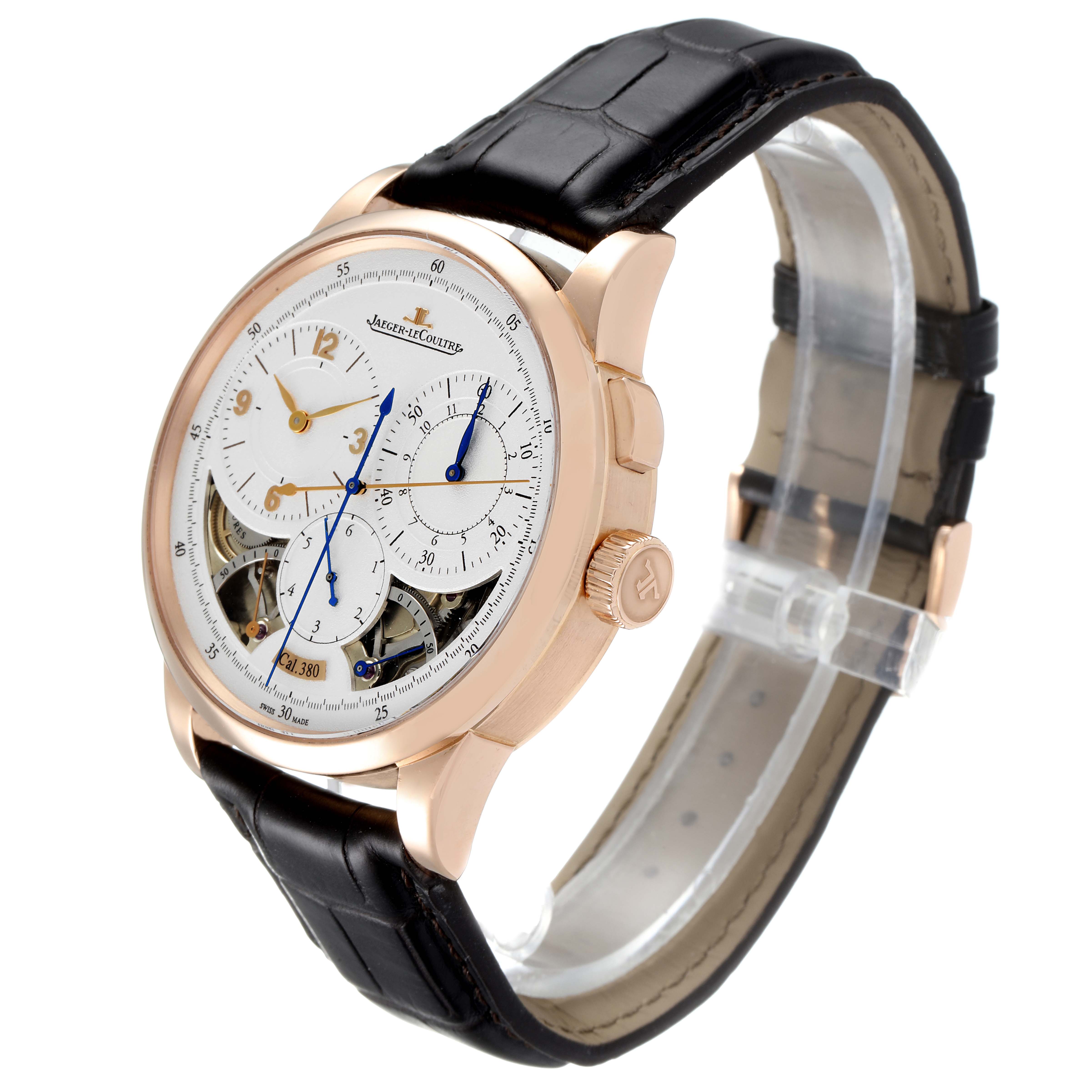 The image shows a Jaeger-LeCoultre Duomètre watch at a three-quarter angle, highlighting the face, gold case, crown, and black leather strap.