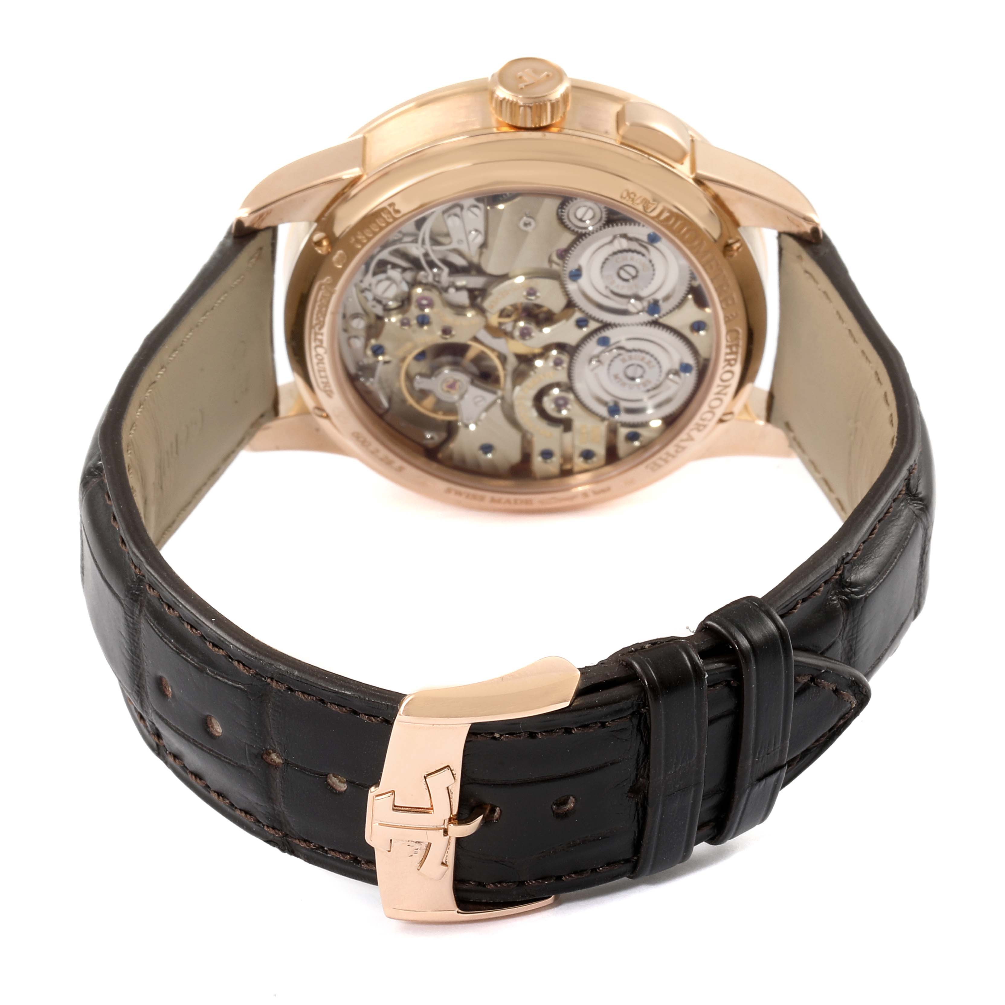 The image shows the back view of a Jaeger LeCoultre Duometre Q6012521 Men's Rose Gold Silver Dial Q6012521 Men's Rose Gold Silver Dial watch, highlighting its movement and black leather strap.