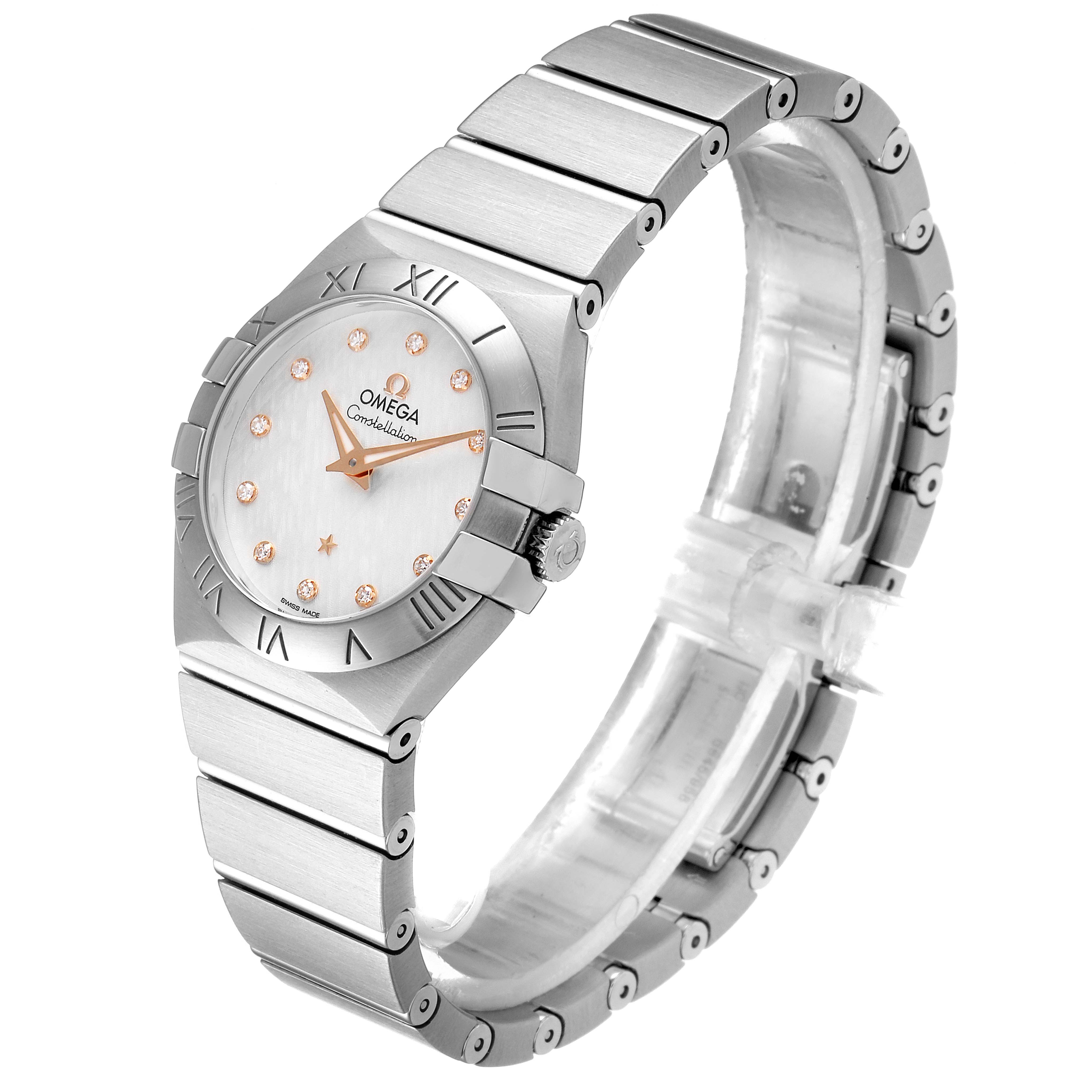 The image shows a side profile of the Omega 123.10.27.60.52.001 Women
s Stainless Steel Silver Dial 123.10.27.60.52.001 Women
s Stainless Steel Silver Dial Constellation 27mm Diamond Steel Ladies Watch 123.10.27.60.52.001, highlighting its bracelet and bezel.