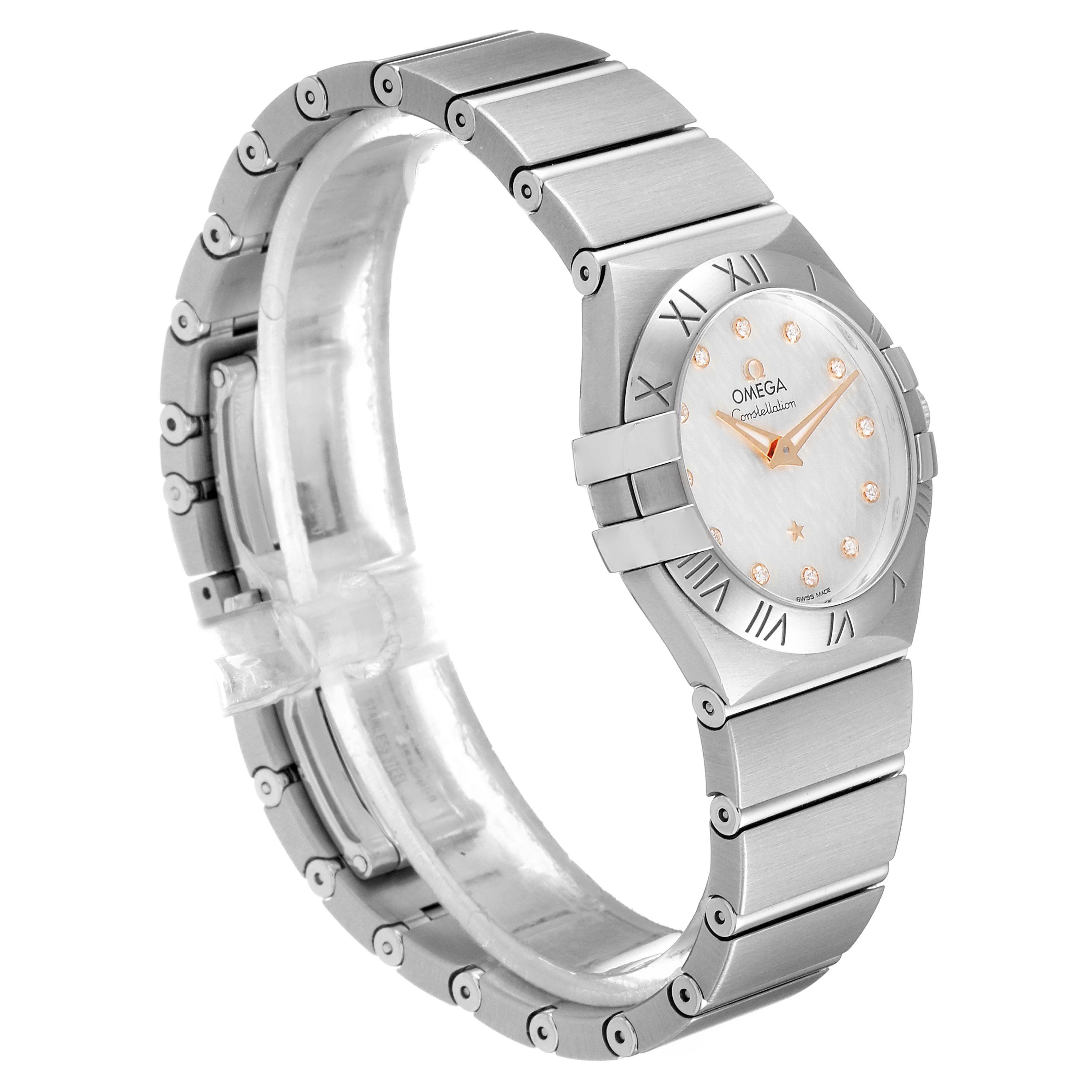 The image displays an angled side view of the Omega 123.10.27.60.52.001 Women
s Stainless Steel Silver Dial 123.10.27.60.52.001 Women
s Stainless Steel Silver Dial Constellation 27mm Diamond Steel Ladies Watch 123.10.27.60.52.001.