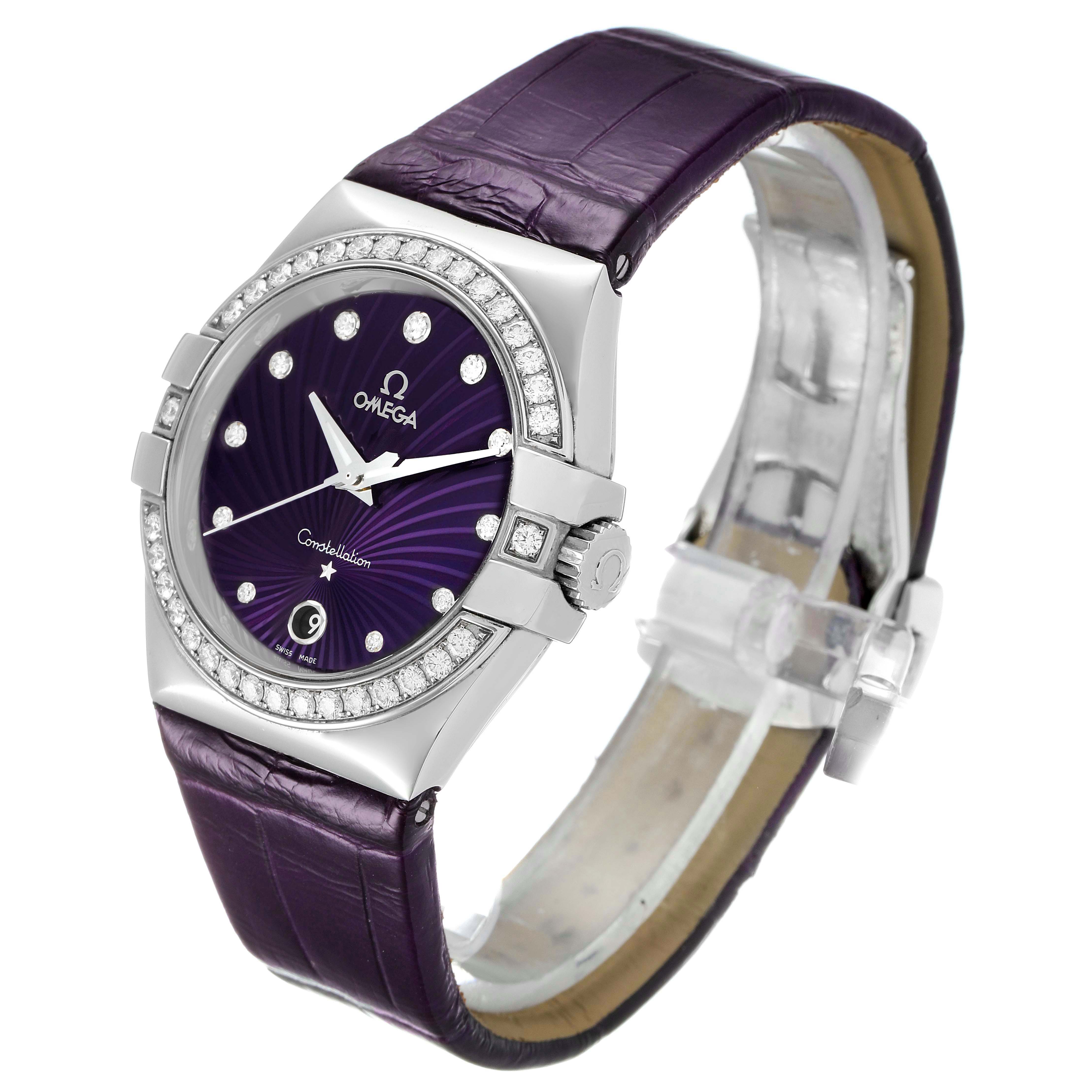 The Omega 123.18.35.60.60.001 Women's Stainless Steel Purple Dial 123.18.35.60.60.001 Women's Stainless Steel Purple Dial Constellation 35mm Diamond Steel Ladies Watch 123.18.35.60.60.001 is shown at a slight angled side view, highlighting its bezel, face, and strap.