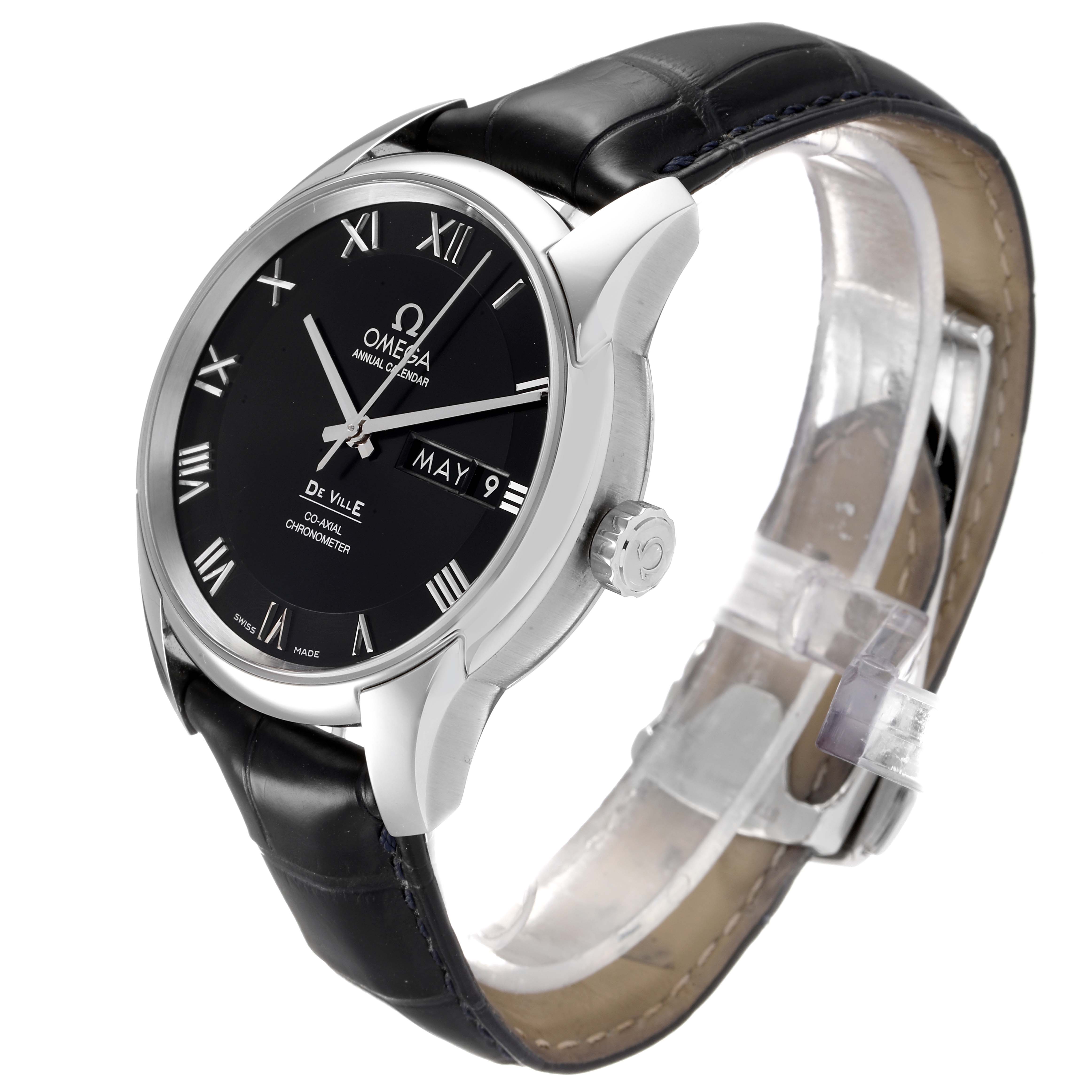 The image shows the De Ville model by Omega from a three-quarter angle, highlighting the black dial, leather strap, and crown.