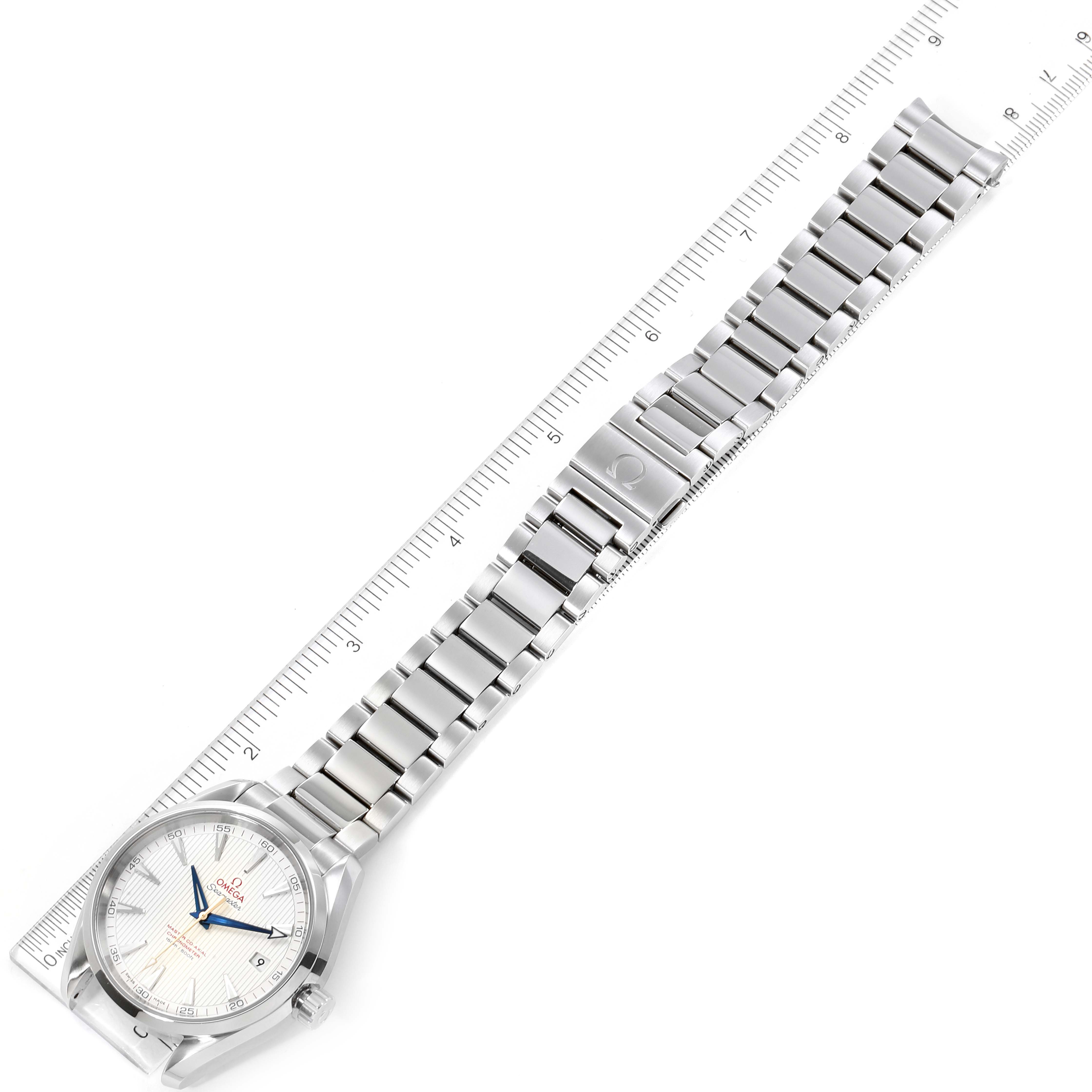The image shows the Omega Aqua Terra 231.10.42.21.02.004 Men
s Stainless Steel Silver Dial 231.10.42.21.02.004 Men
s Stainless Steel Silver Dial watch laid flat, highlighting its face, bracelet, and clasp with a ruler for scale.