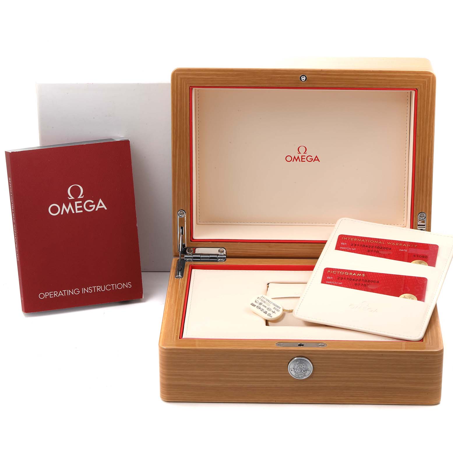 The image shows an Omega Aqua Terra 231.10.42.21.02.004 Men
s Stainless Steel Silver Dial 231.10.42.21.02.004 Men
s Stainless Steel Silver Dial watch box, operating instructions booklet, warranty cards, and a cardholder.