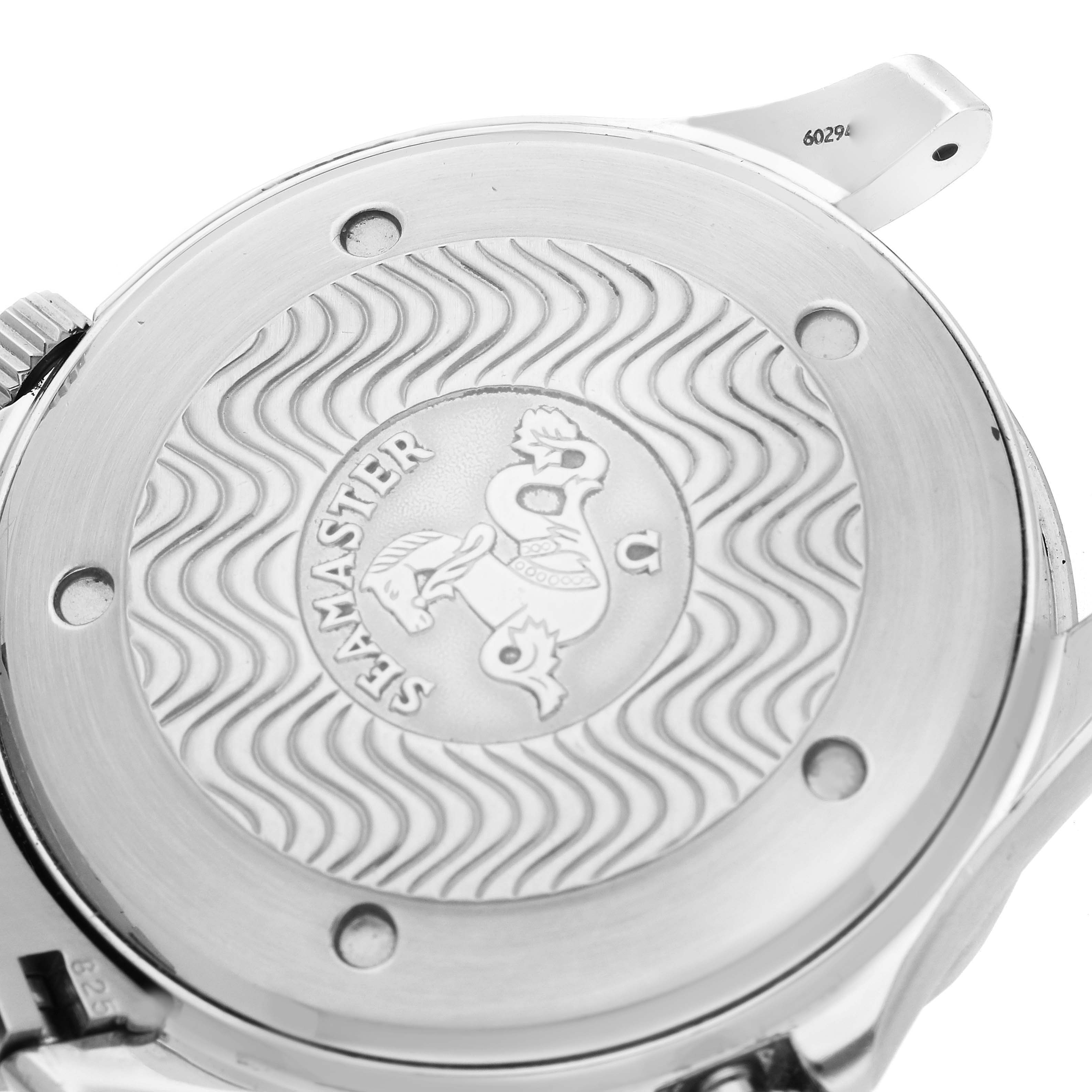 The image shows the back case of an Omega Seamaster 2531.80.00 Men
s Stainless Steel Blue Dial 2531.80.00 Men
s Stainless Steel Blue Dial watch with an engraved wavy pattern and emblem.