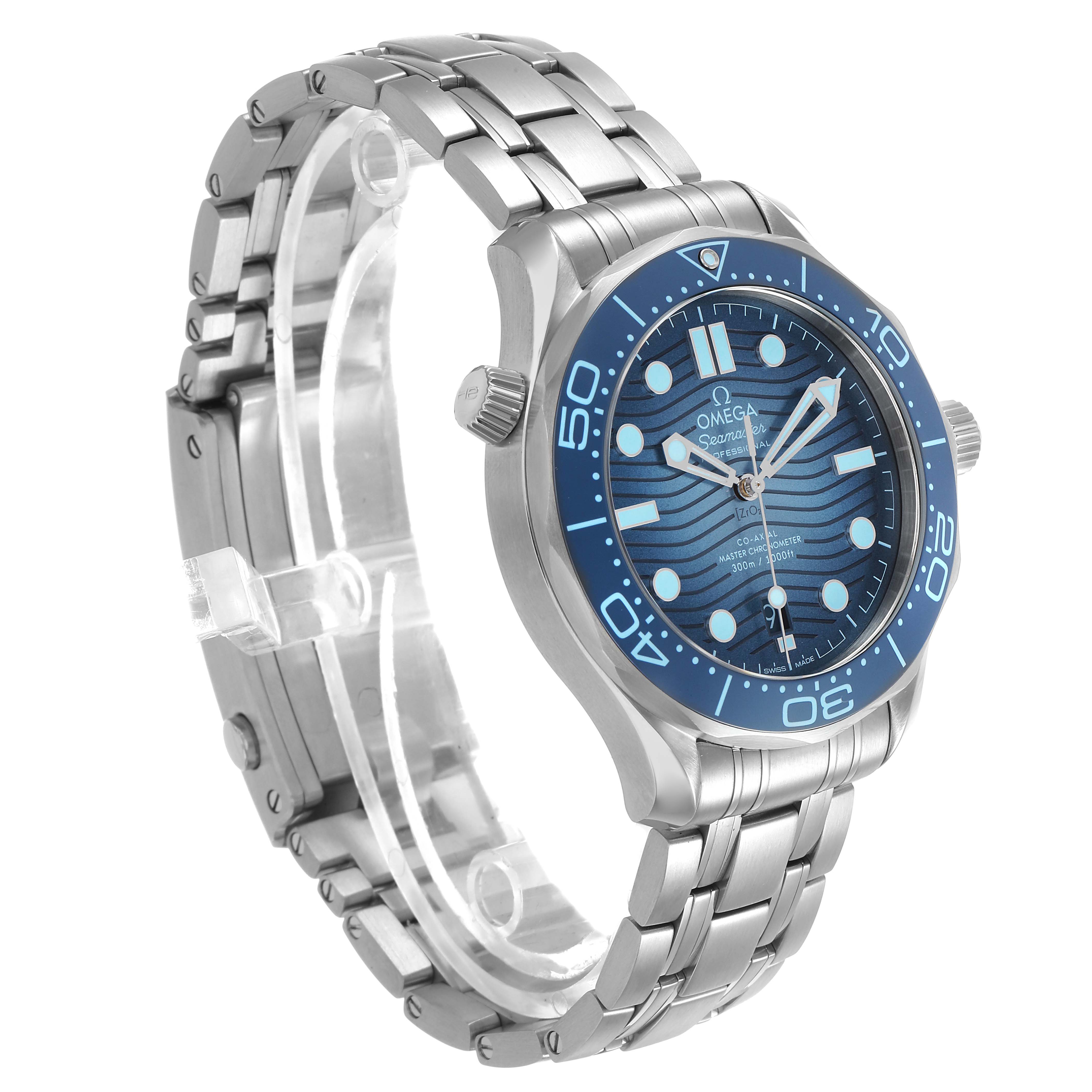 The Omega Seamaster 210.30.42.20.03.003 Men's Stainless Steel Blue Dial watch is shown at a three-quarter angle, displaying the face, bezel, crown, and metal bracelet.
