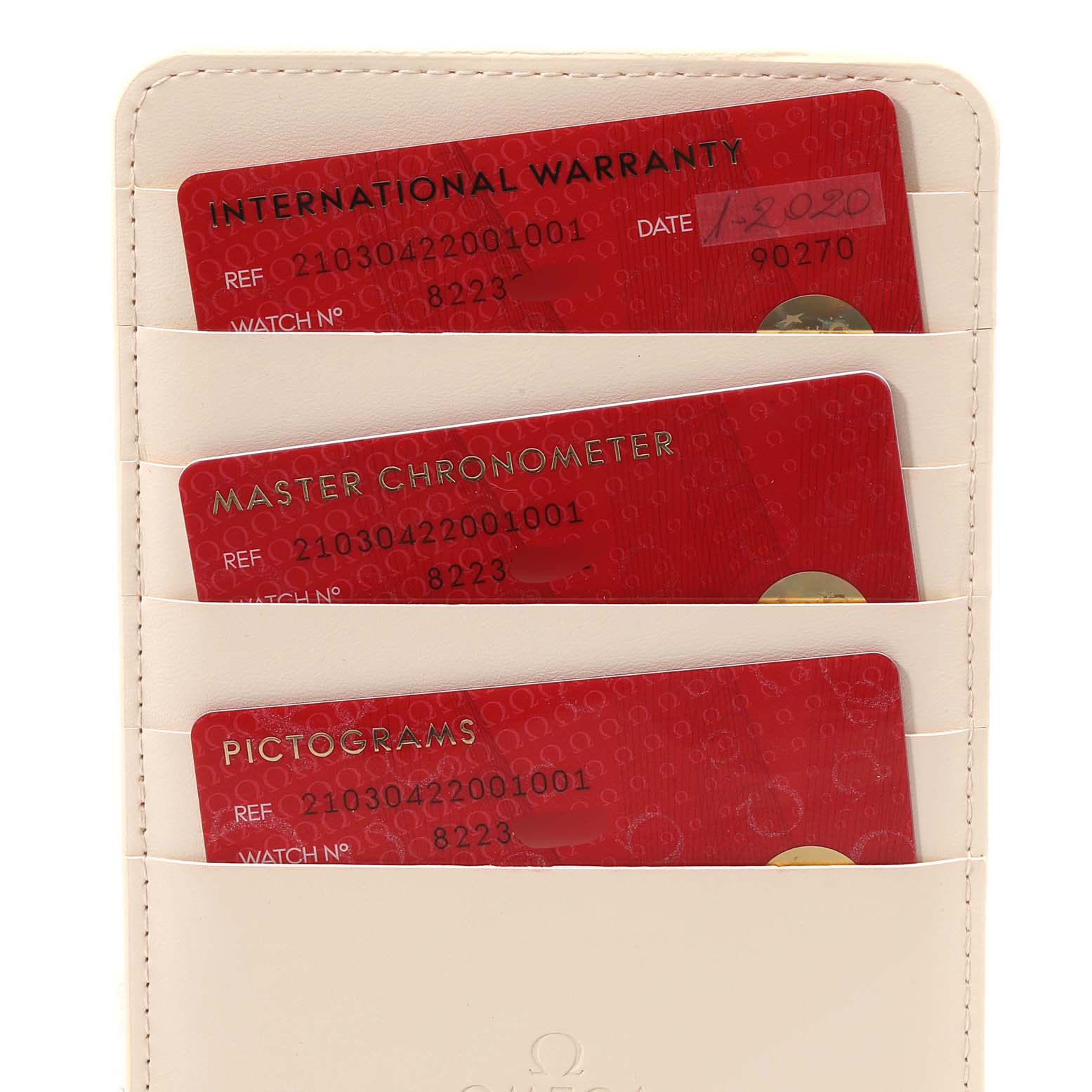 The image shows warranty and certification cards for the Omega Seamaster 210.30.42.20.01.001 Men's Stainless Steel Black Dial 210.30.42.20.01.001 Men's Stainless Steel Black Dial watch in a white cardholder.