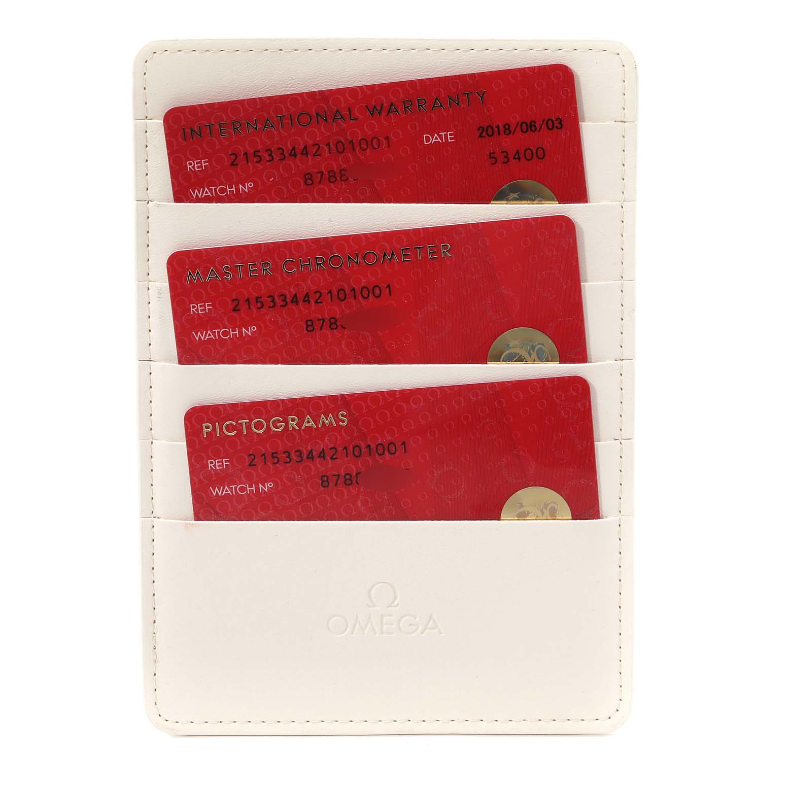 This image displays three red cards, labeled "International Warranty", "Master Chronometer", and "Pictograms" with the Omega logo.