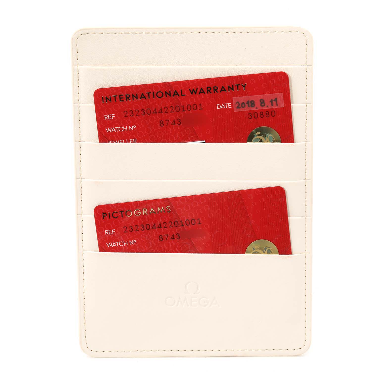 The image shows warranty cards for the Omega Planet Ocean 232.30.44.22.01.001 Men
s Stainless Steel Black Dial 232.30.44.22.01.001 Men
s Stainless Steel Black Dial model placed in a white cardholder.