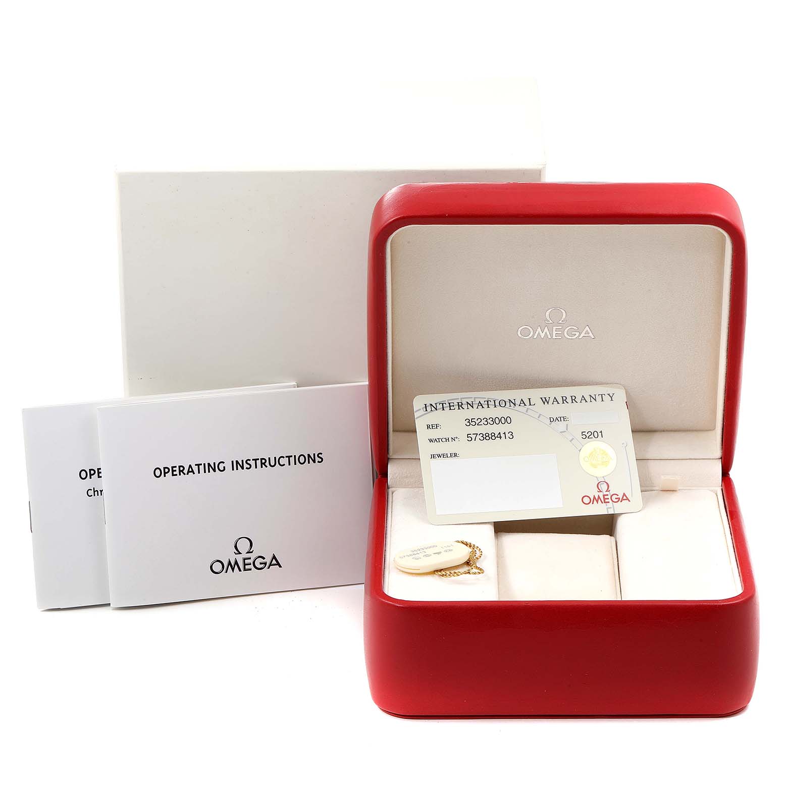 This image shows an Omega Speedmaster 3523.30.00 Men
s Stainless Steel Silver Dial 3523.30.00 Men
s Stainless Steel Silver Dial box with operating instructions, an international warranty card, and additional accessories.