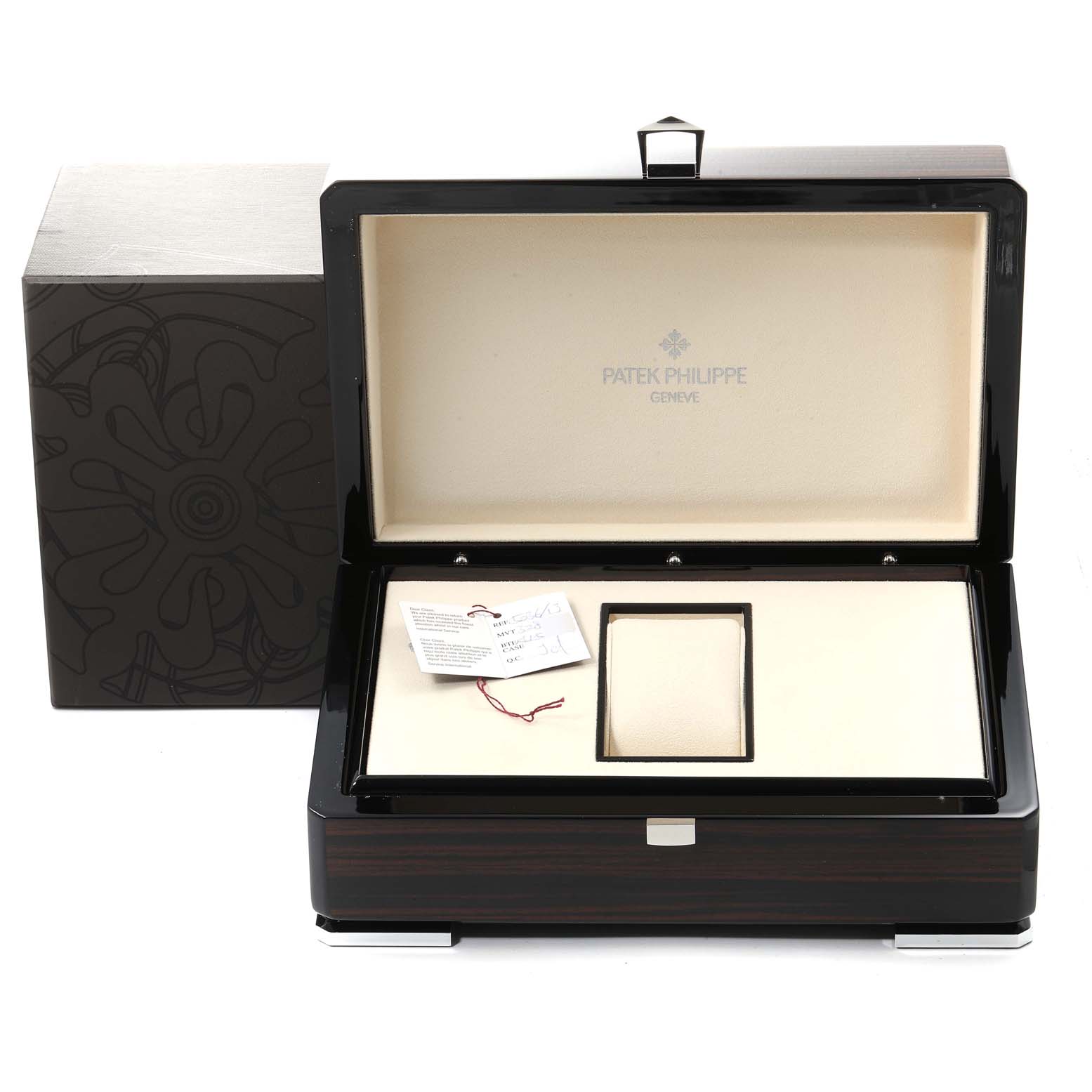 The image shows the open packaging of the Patek Philippe 5036/1J Men's Yellow Gold White Dial 5036/1J Men's Yellow Gold White Dial Annual Calendar Moonphase Yellow Gold Mens Watch 5036 model, with tags and box.