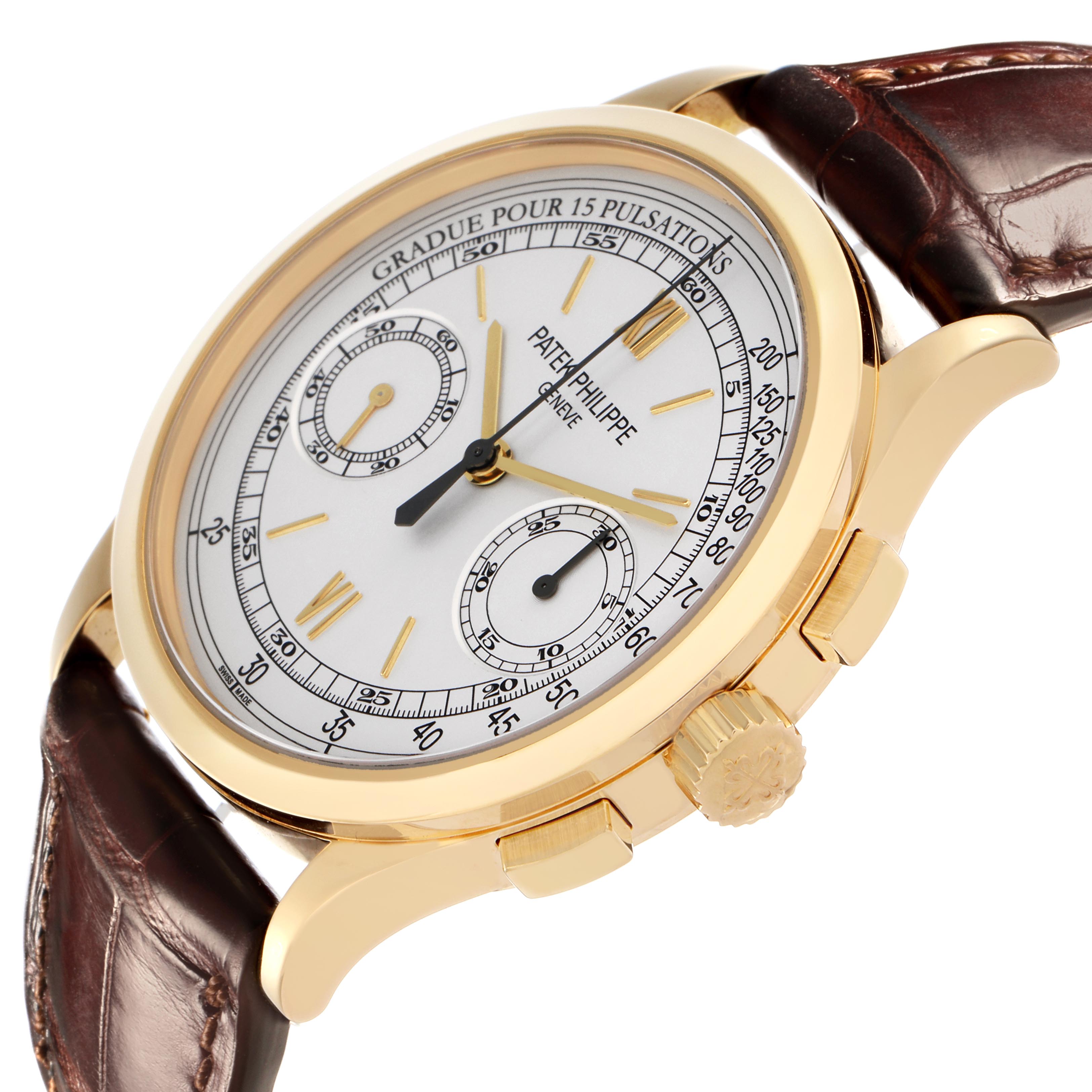 The Patek Philippe Complications 5170J Men
s Yellow Gold Silver Dial 5170J Men
s Yellow Gold Silver Dial watch is shown at an angle highlighting the crown, case, dial, and leather strap.