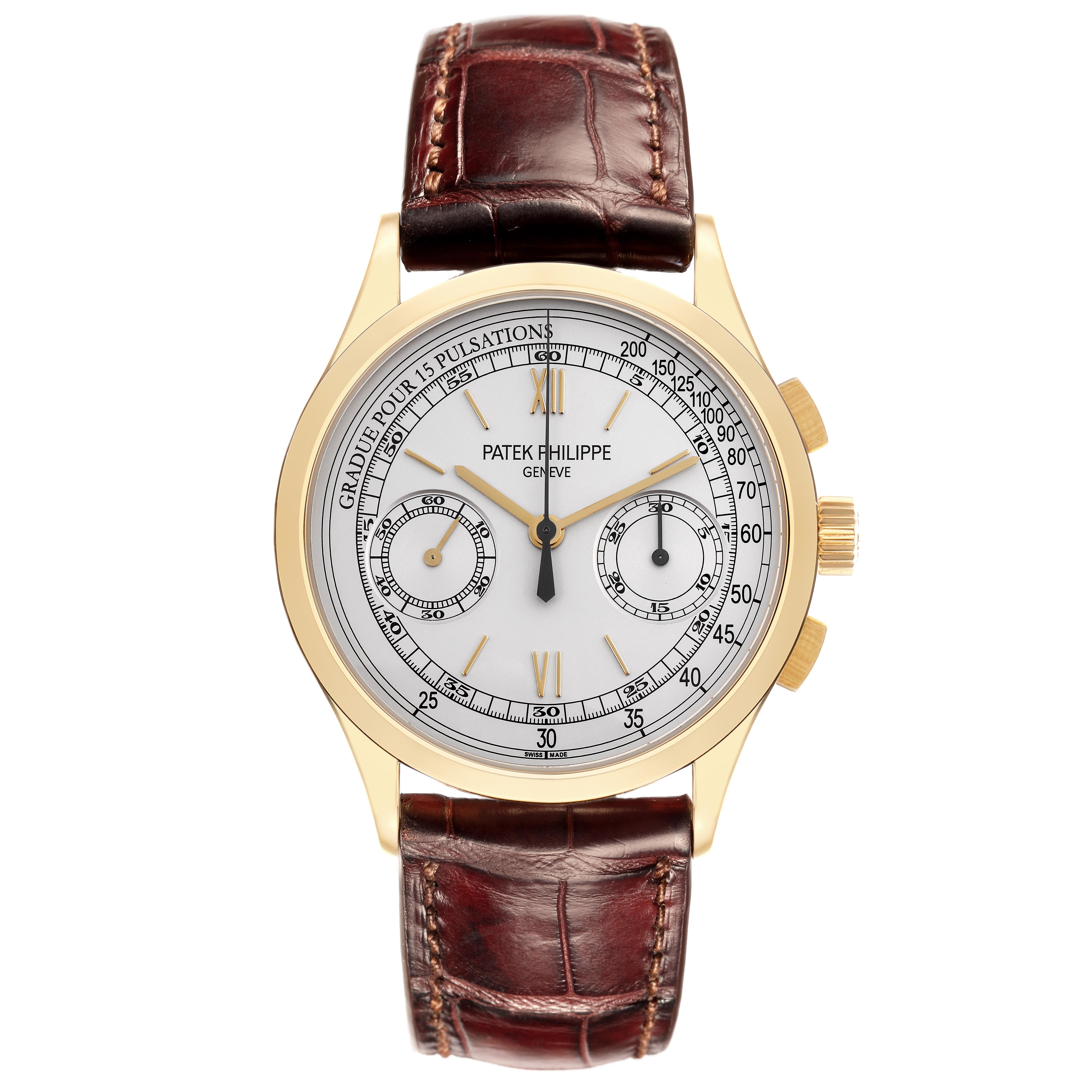 The Patek Philippe Complications 5170J Men
s Yellow Gold Silver Dial 5170J Men
s Yellow Gold Silver Dial watch is shown from the front, highlighting its dial, leather strap, and side buttons.