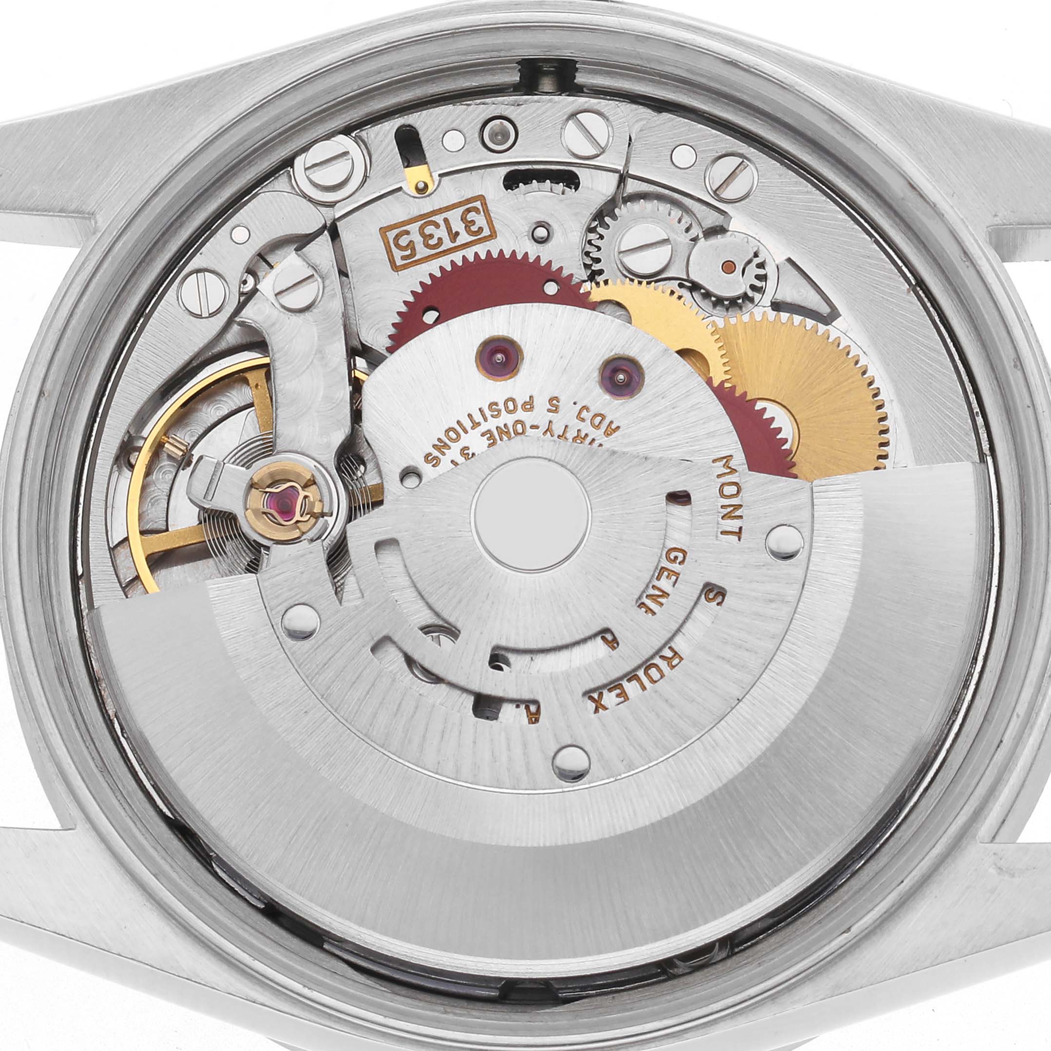 The image shows a top-down view of the Rolex Date 15210 Men
s Stainless Steel Silver Dial 15210 Men
s Stainless Steel Silver Dial model
s movement, revealing gears and mechanical components.