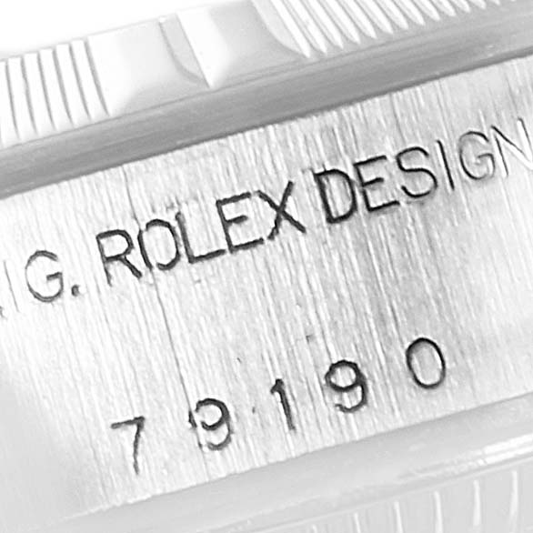 The image shows an engraved side view of a Rolex Date 79190 Women's Stainless Steel Silver Dial 79190 Women's Stainless Steel Silver Dial model, displaying the serial number and "ROLEX DESIGN" text.