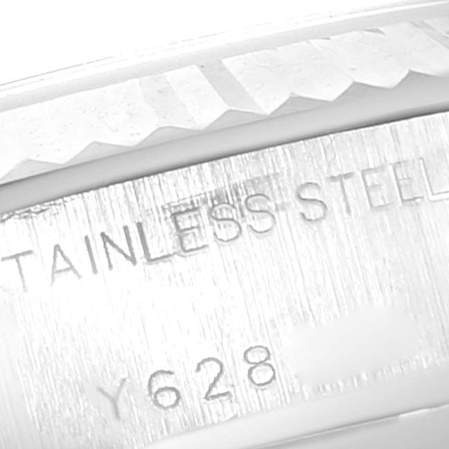 The image shows a close-up angle of the etched stainless steel bezel of a Rolex Datejust 79174 Women
s Stainless Steel Silver Dial 79174 Women
s Stainless Steel Silver Dial watch.