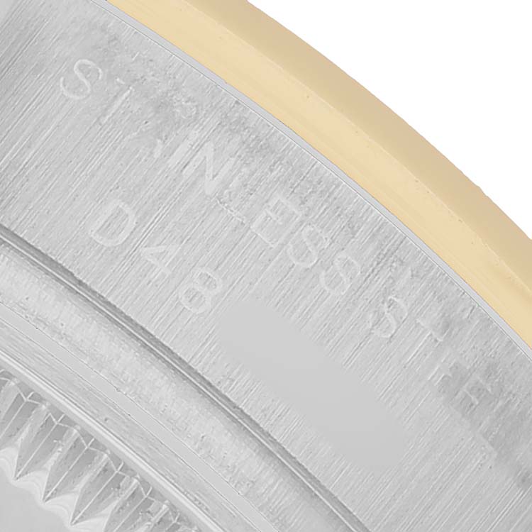 The image shows a close-up of the bezel and part of the case of a Rolex Datejust 179163 Women's Stainless Steel Grey Dial, highlighting the stainless steel material.
