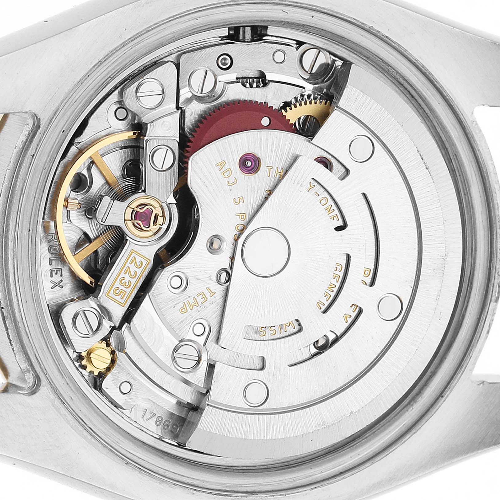 The image shows the inner mechanism of a Rolex Datejust 179163 Women's Stainless Steel Grey Dial watch from a top-down angle, revealing gears and components.