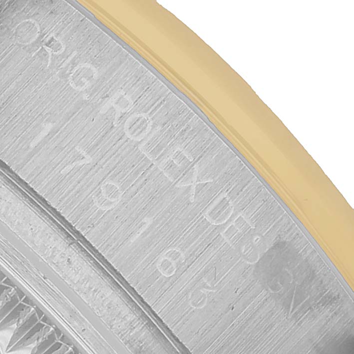 The image shows the engraved side of a Rolex Datejust 179163 Women's Stainless Steel Grey Dial watch case, highlighting the model number and design.