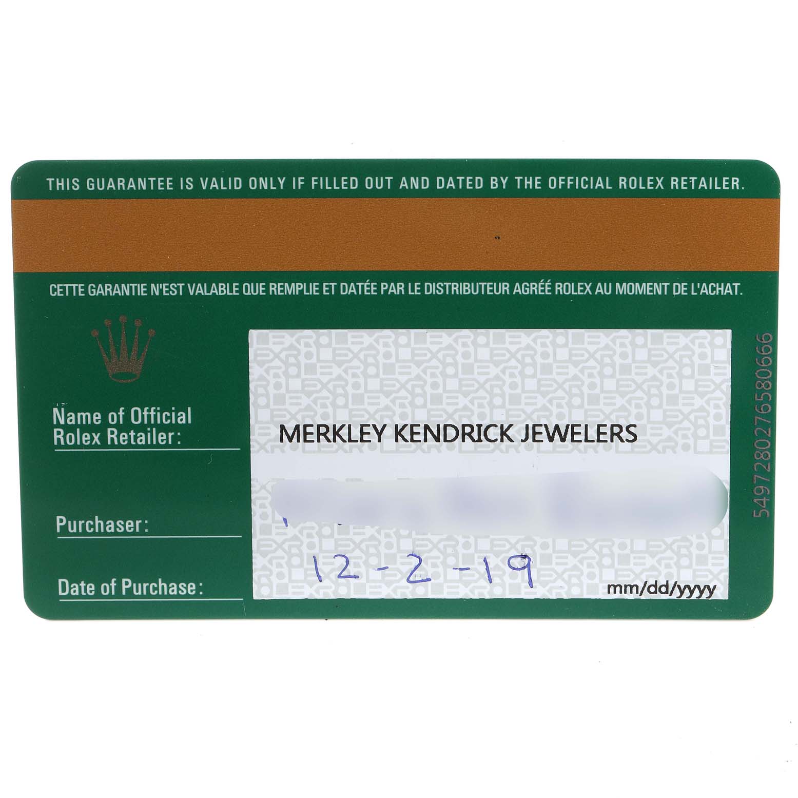 This image shows the guarantee card for a Mid-Size Rolex watch from Merkley Kendrick Jewelers.