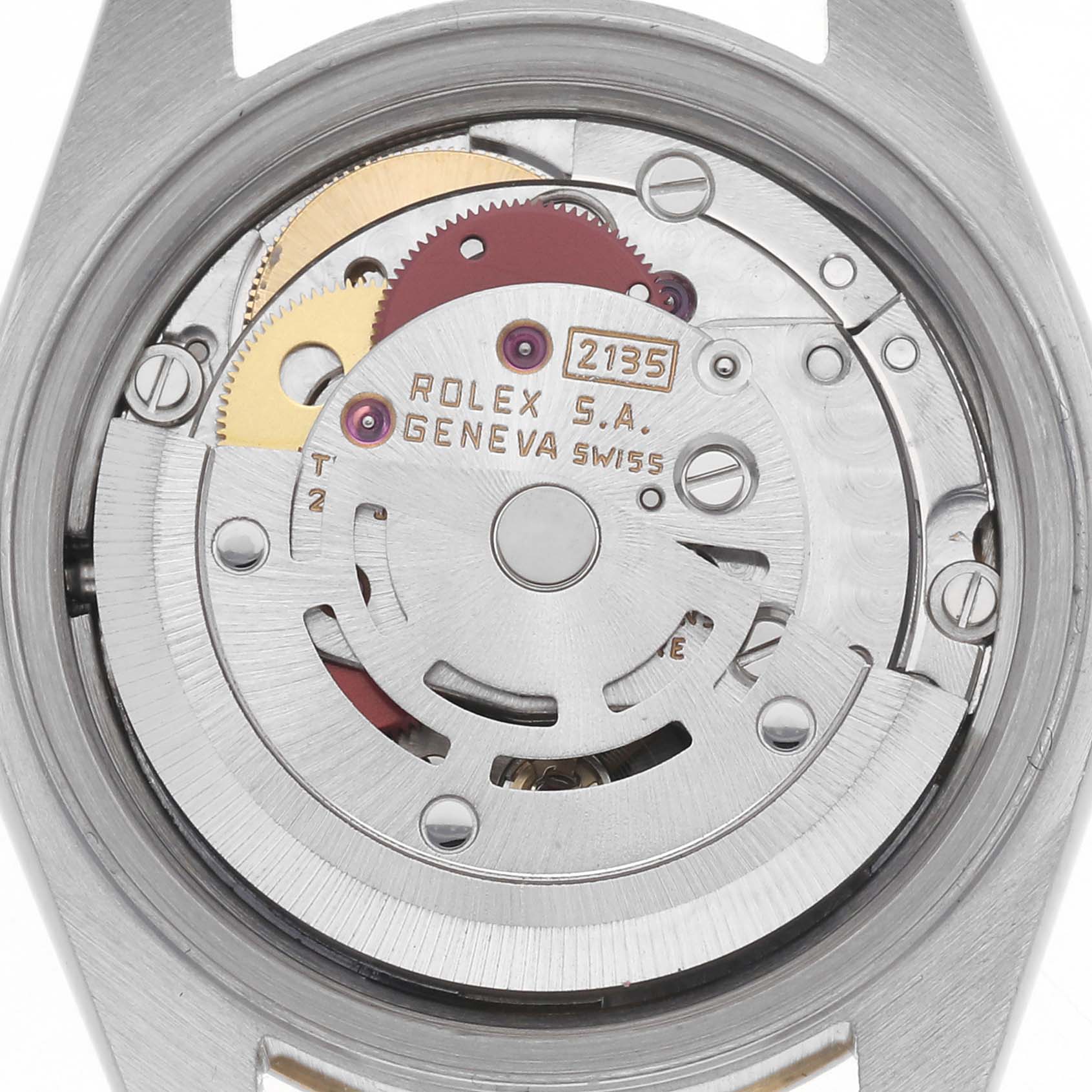 The image shows the movement of a Rolex Datejust 69173 Women's Steel and Gold (two tone) Champagne Dial 69173 Women's Steel and Gold (two tone) Champagne Dial watch from a rear angle, highlighting the rotor and gears.