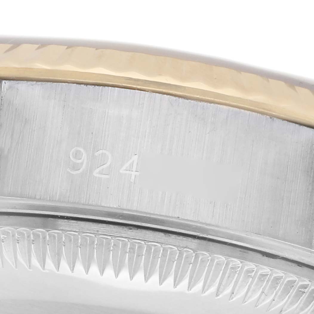 The image shows a close-up of the serial number area and bezel edge of a Rolex Datejust 69173 Women's Steel and Gold (two tone) Champagne Dial 69173 Women's Steel and Gold (two tone) Champagne Dial watch.