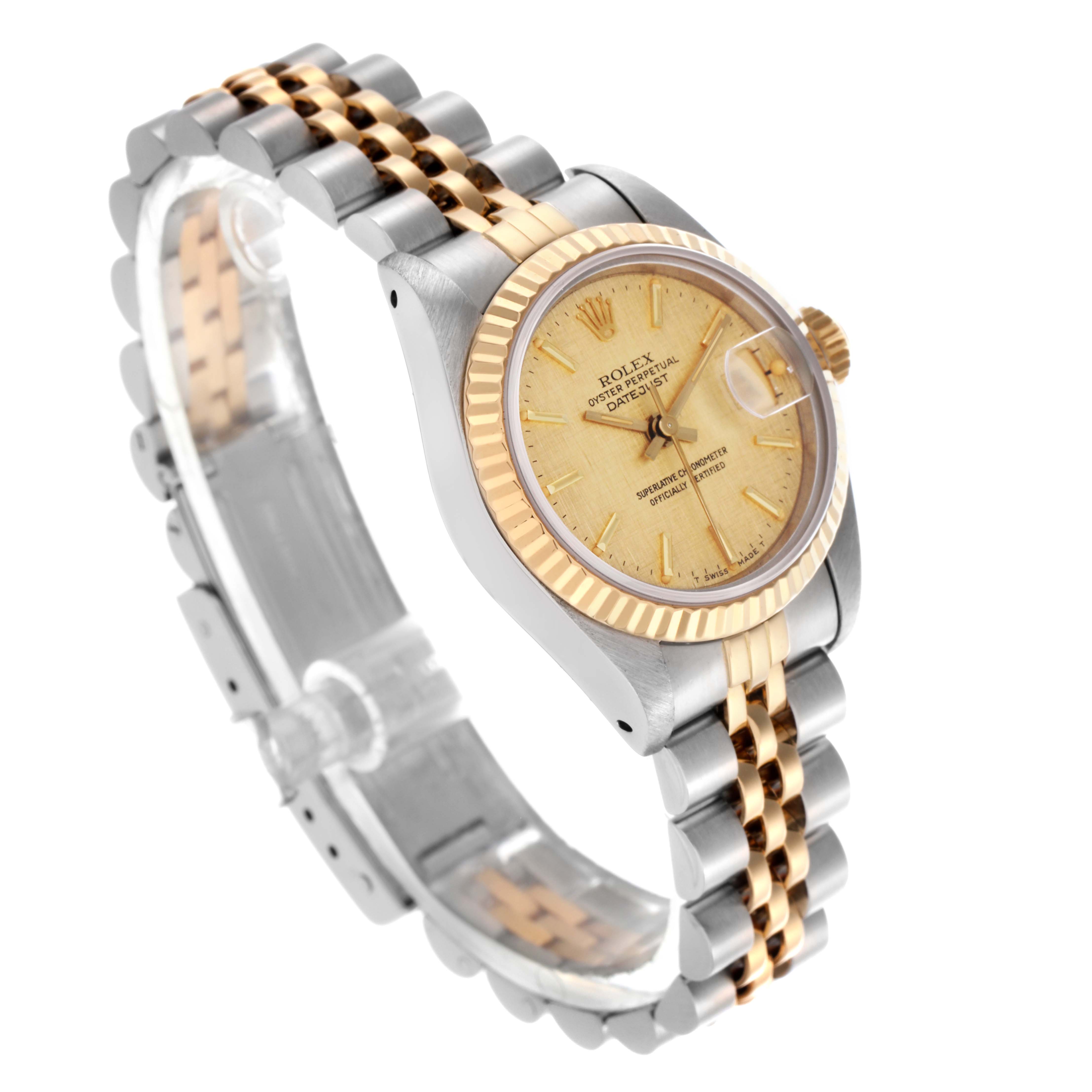 The Rolex Datejust 69173 Women's Steel and Gold (two tone) Champagne Dial 69173 Women's Steel and Gold (two tone) Champagne Dial watch is shown at a three-quarter angle, displaying the dial, bezel, crown, and bracelet.