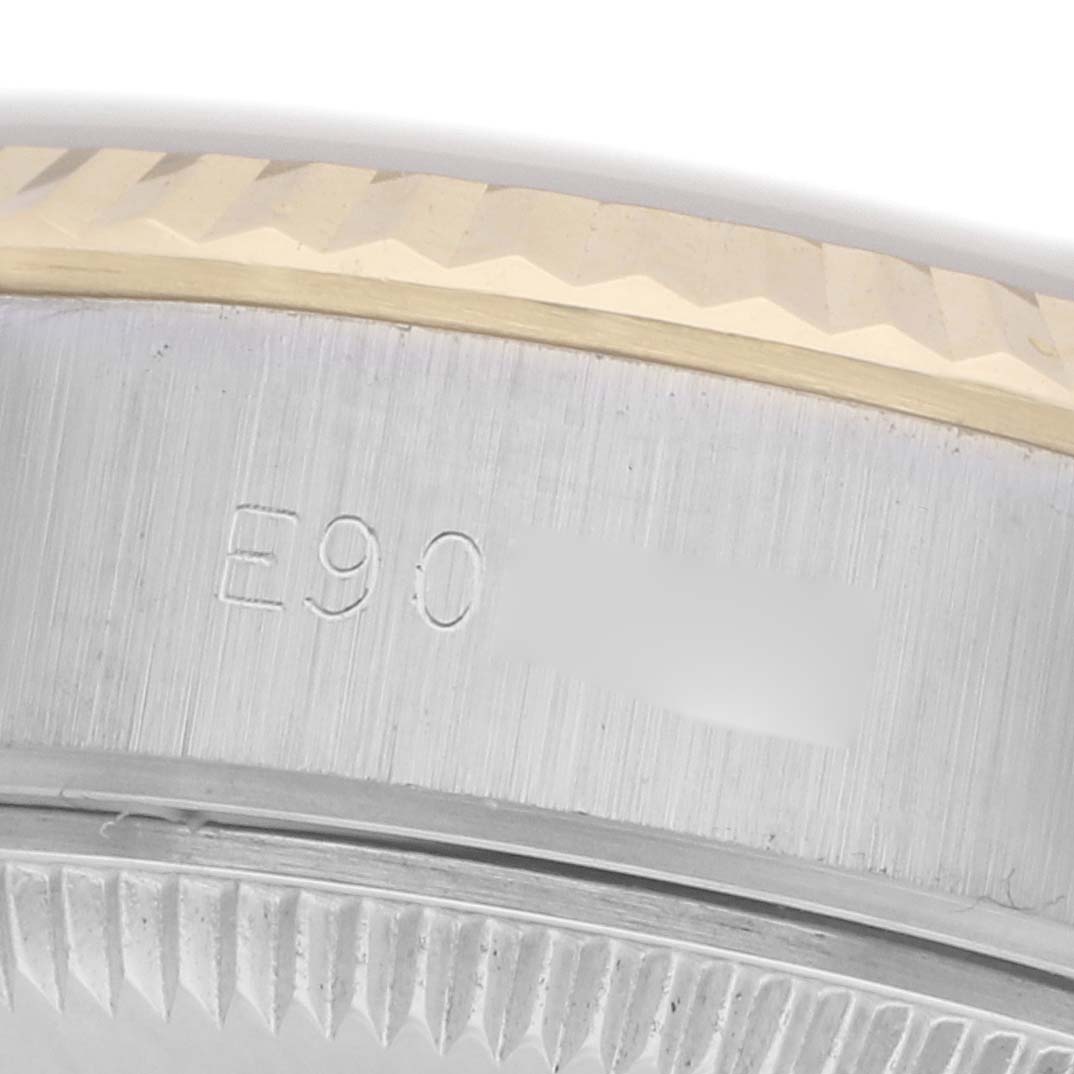 The image shows a close-up angle of the watch's case side, highlighting the bezel and engraving on the Rolex Datejust 69173 Women's Steel and Gold (two tone) Champagne Dial 69173 Women's Steel and Gold (two tone) Champagne Dial.