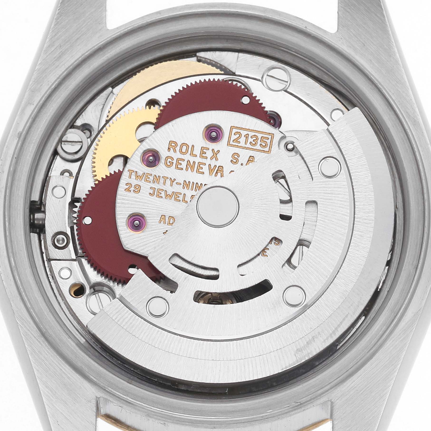 The image shows a close-up of the Rolex Datejust 69173 Women's Steel and Gold (two tone) Champagne Dial 69173 Women's Steel and Gold (two tone) Champagne Dial watch movement from the back, highlighting gears and jewels.
