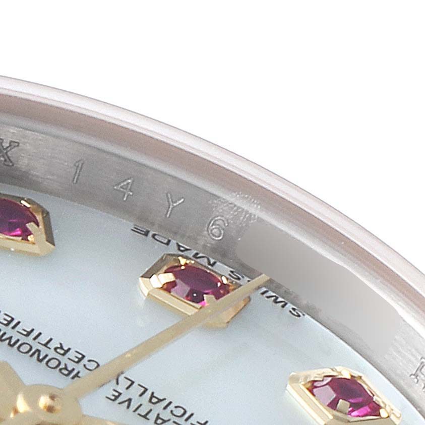 This close-up angle of the Rolex Datejust 179173 Women's Steel and Gold (two tone) Mother of Pearl Dial 179173 Women's Steel and Gold (two tone) Mother of Pearl Dial watch shows part of the dial, hour markers, and bezel.