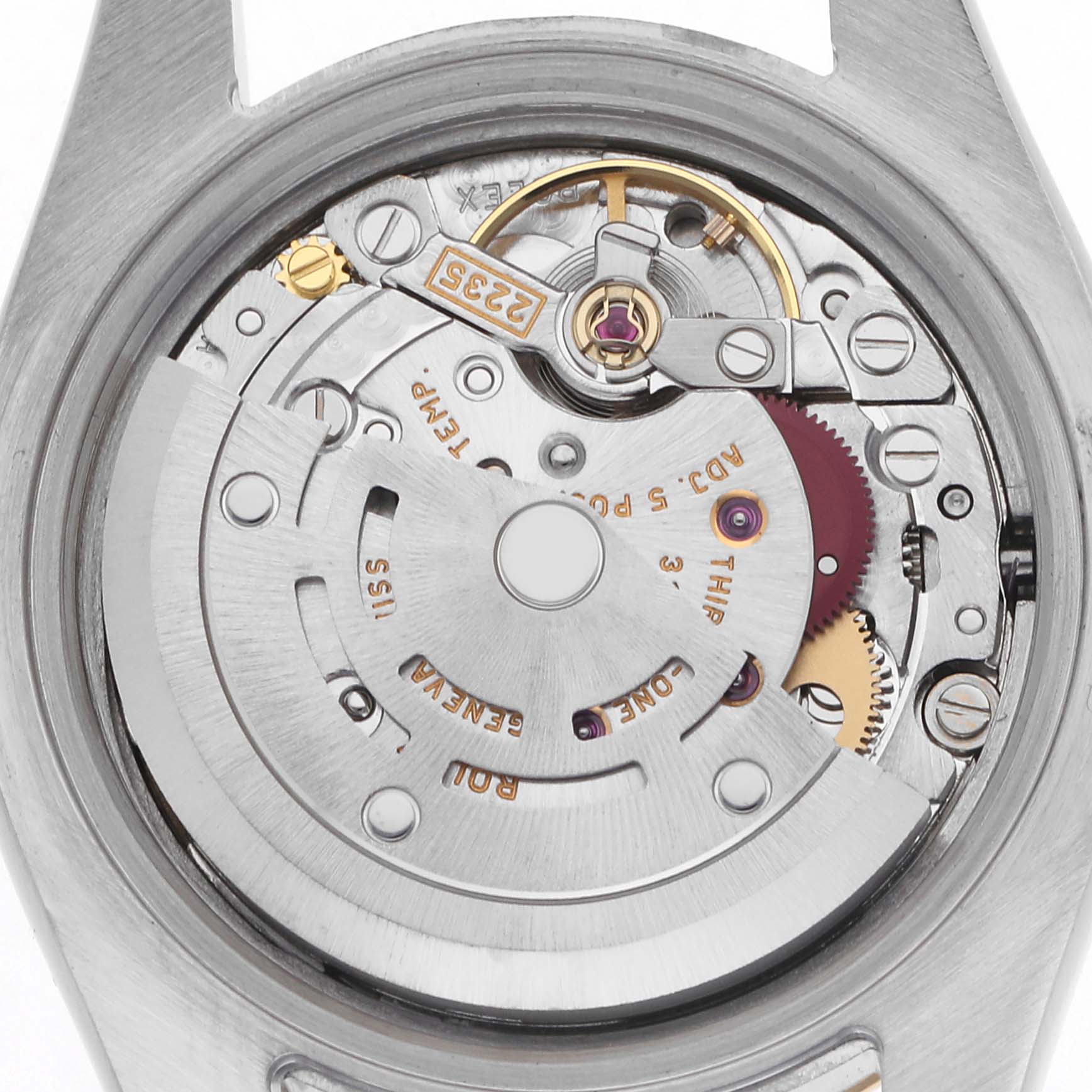 The image shows an overhead view of the Rolex Datejust 179173 Women's Steel and Gold (two tone) White Dial 179173 Women's Steel and Gold (two tone) White Dial's movement and rotor inside the watch case.