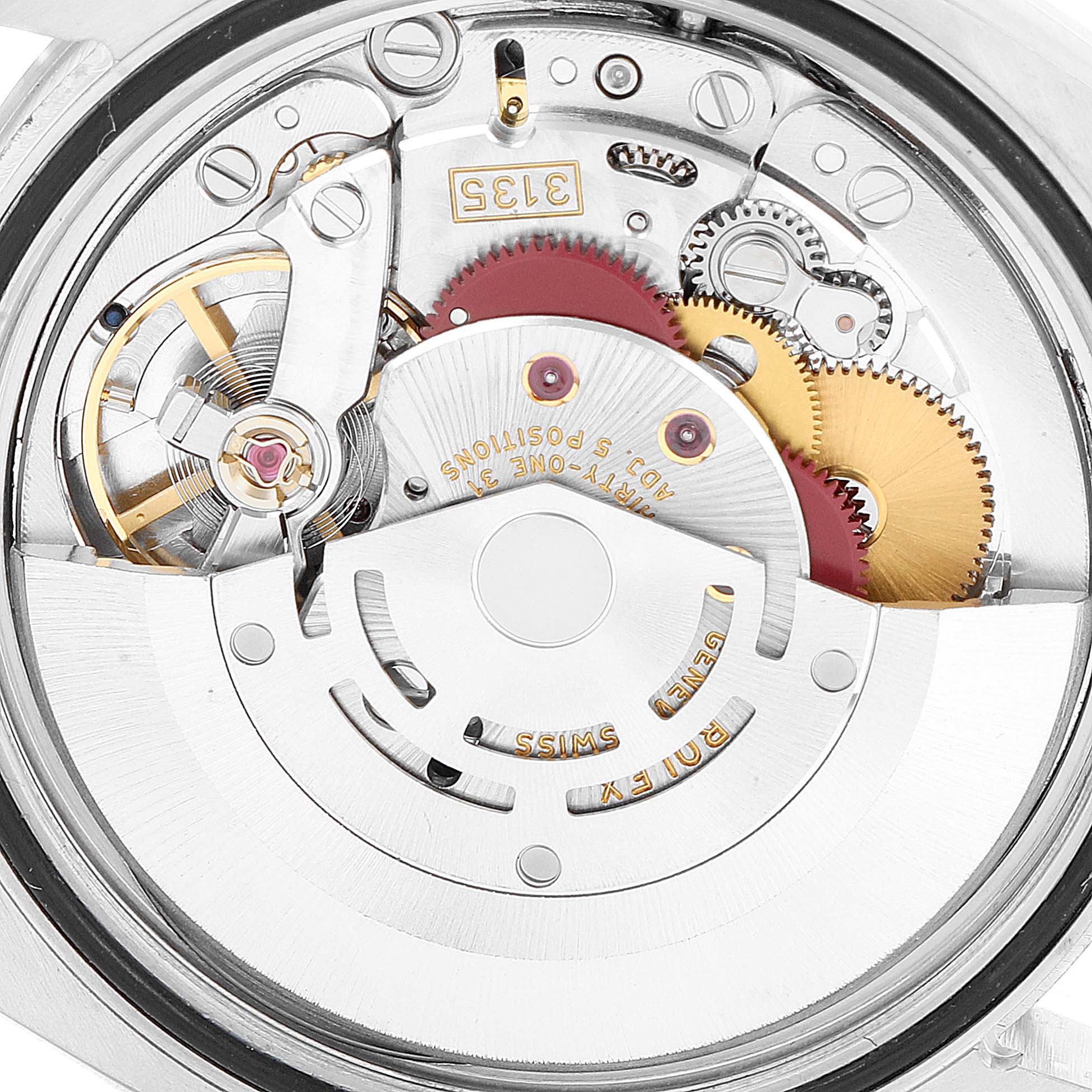 This image shows a close-up of the internal mechanism of the Rolex Turn-o-Graph 116264 Men's Stainless Steel Black Dial 116264 Men's Stainless Steel Black Dial watch, highlighting various gears and components.