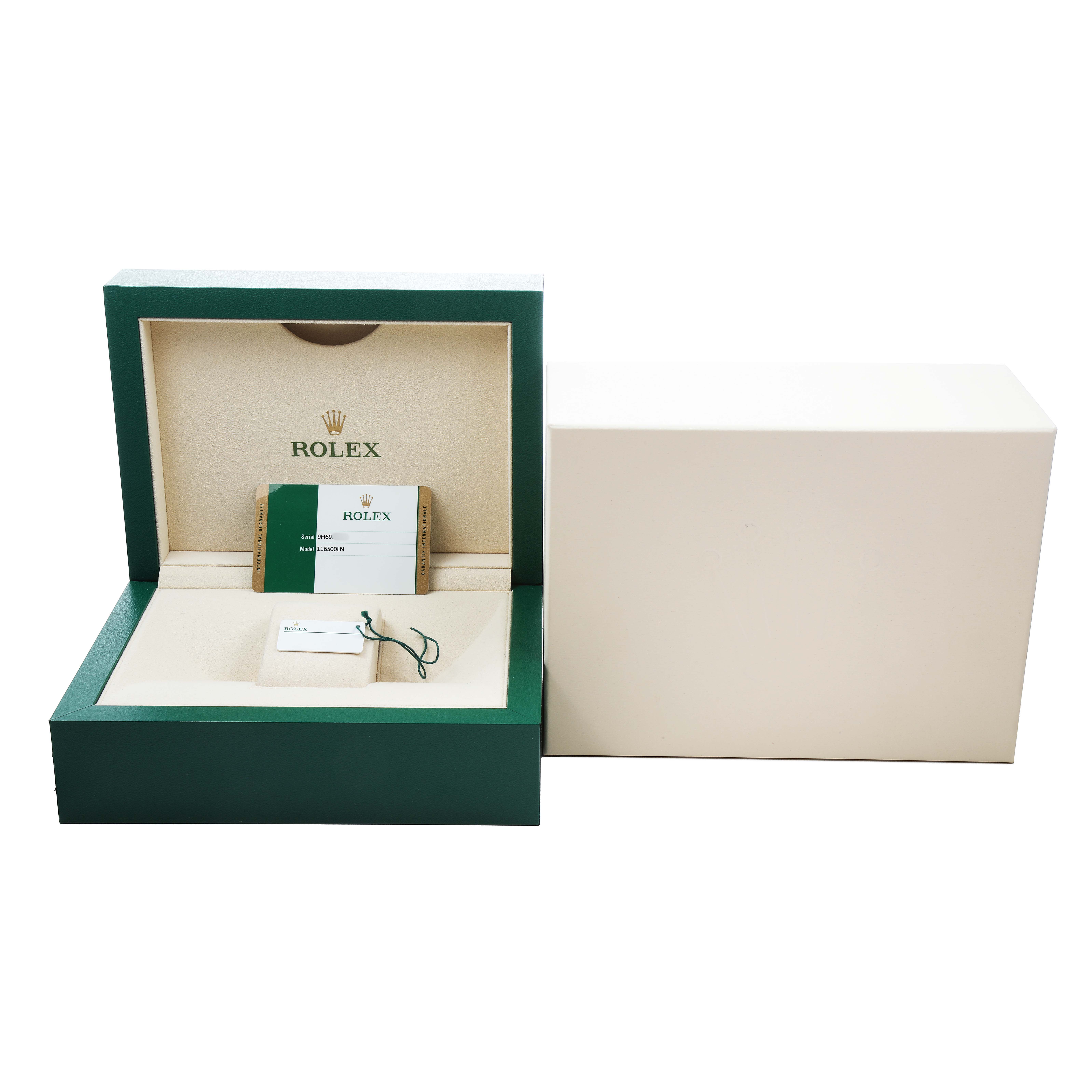 The image shows an open Rolex Daytona M116500LN-0001 Men's Stainless Steel White Dial watch box with a certificate and tag inside, angled from the front.