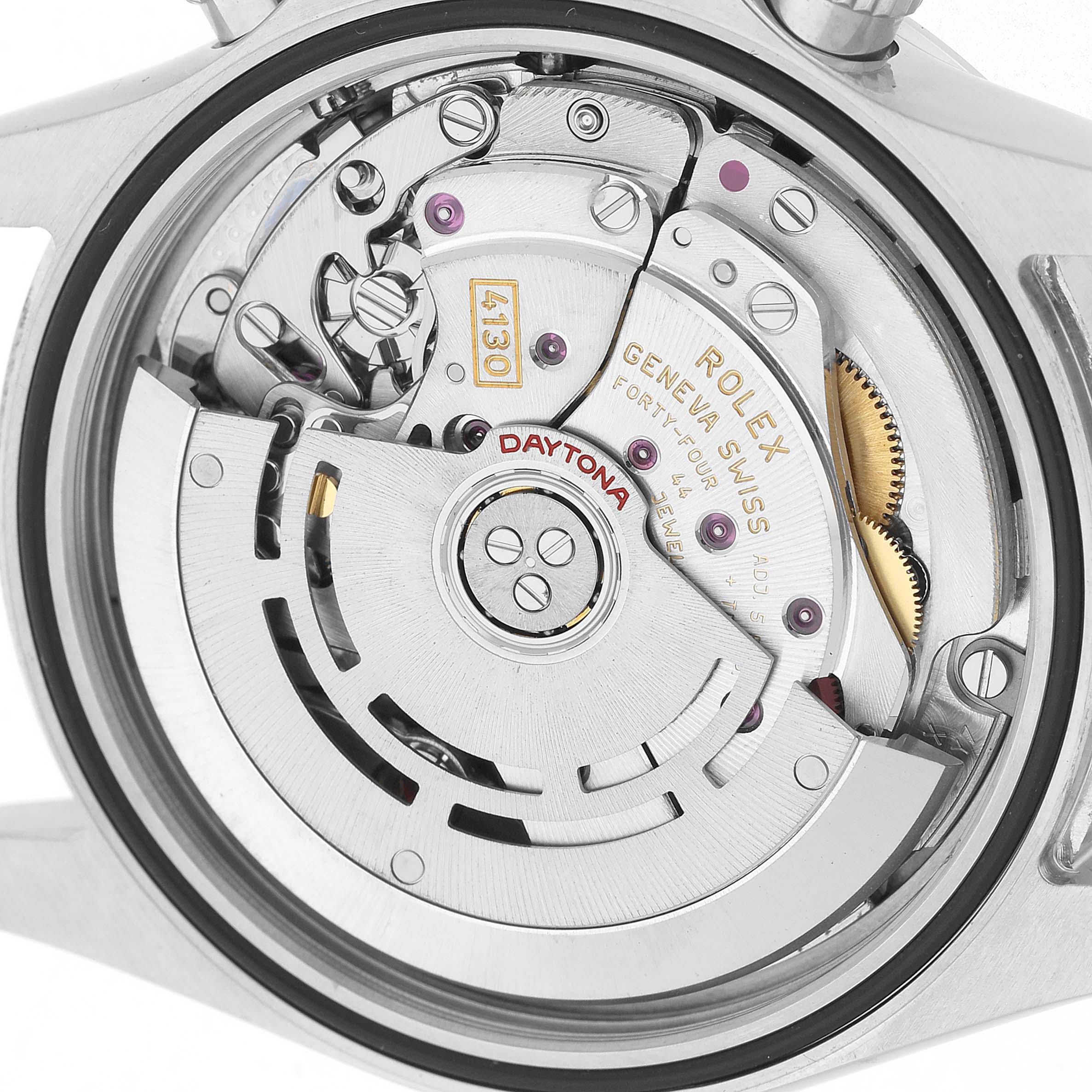 The image shows the backside view of the Rolex Daytona 116520 Men's Stainless Steel White Dial's movement, featuring its intricate gears and components.