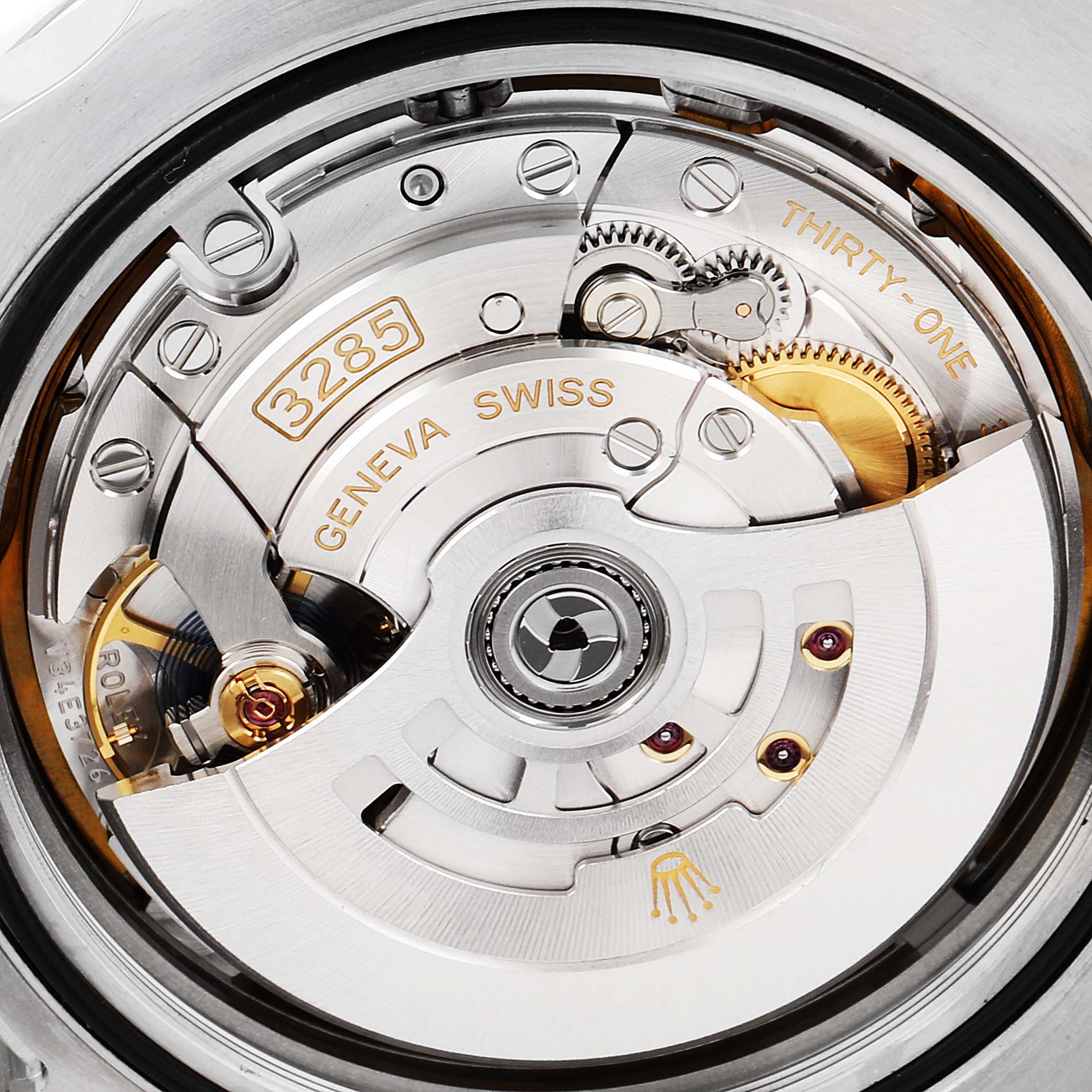 The image shows the intricate movement mechanism of a Rolex Explorer 226570 Men
s Stainless Steel Black Dial 226570 Men
s Stainless Steel Black Dial, showcasing components like gears, the rotor, and Swiss markings.