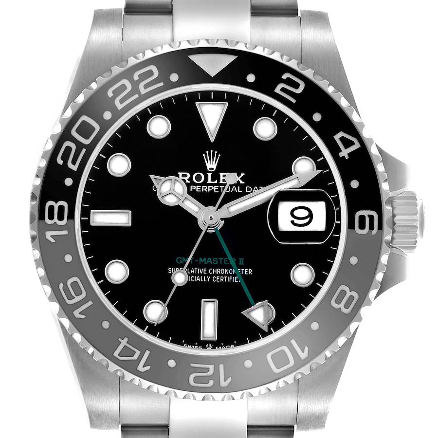 The Rolex GMT-Master watch is shown from a front angle, displaying its bezel, dial, hands, and crown.