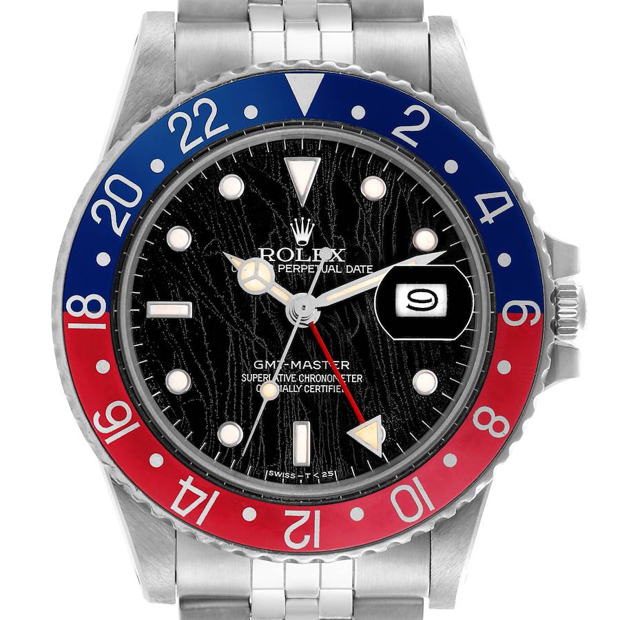 The Rolex GMT-Master watch is shown from the front, displaying its black dial, red and blue bezel, and date window.