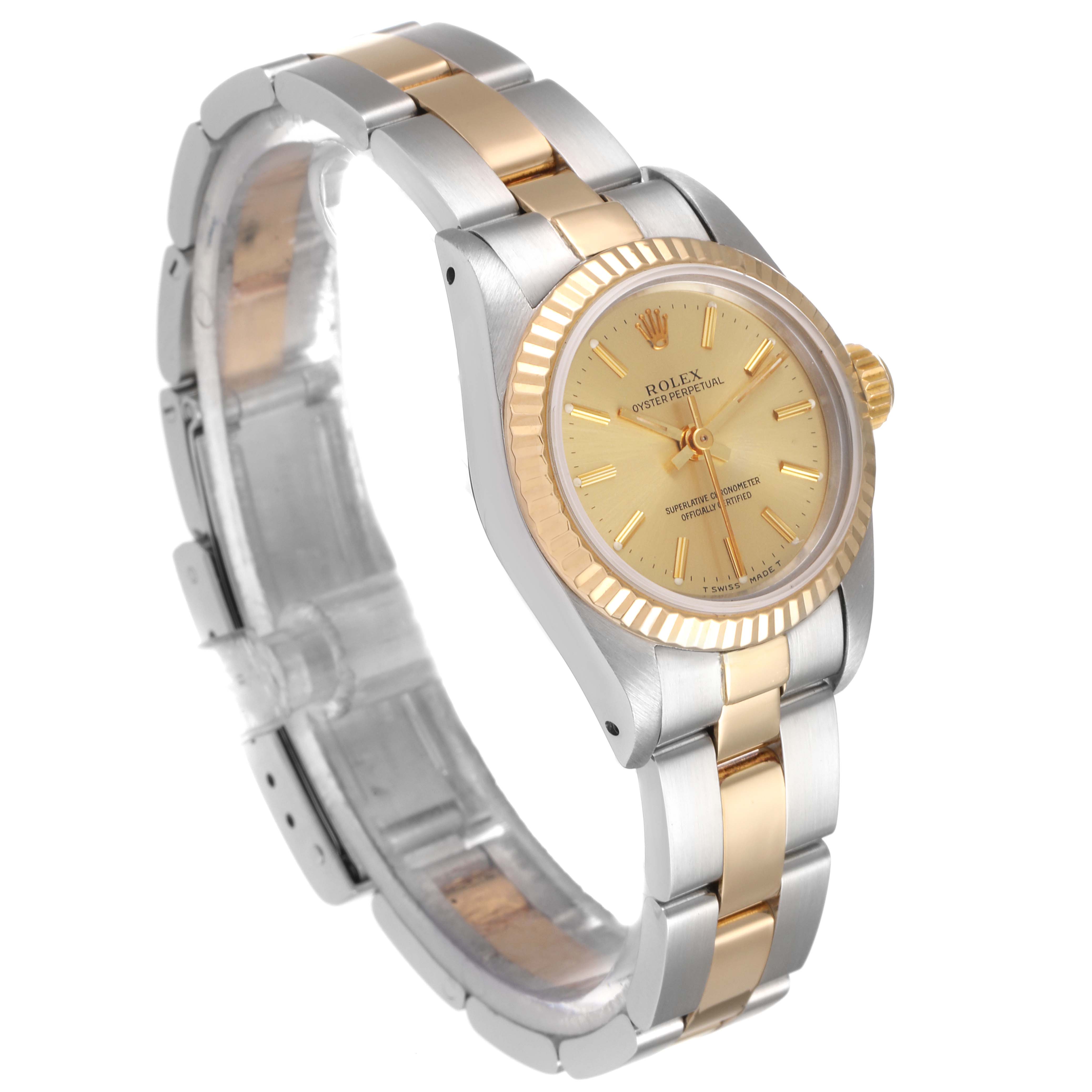 The image shows a side-angle view of the Rolex Oyster Perpetual 67193 Women
s Steel and Gold (two tone) Champagne Dial 67193 Women
s Steel and Gold (two tone) Champagne Dial watch, highlighting its two-tone bracelet, case, and dial.