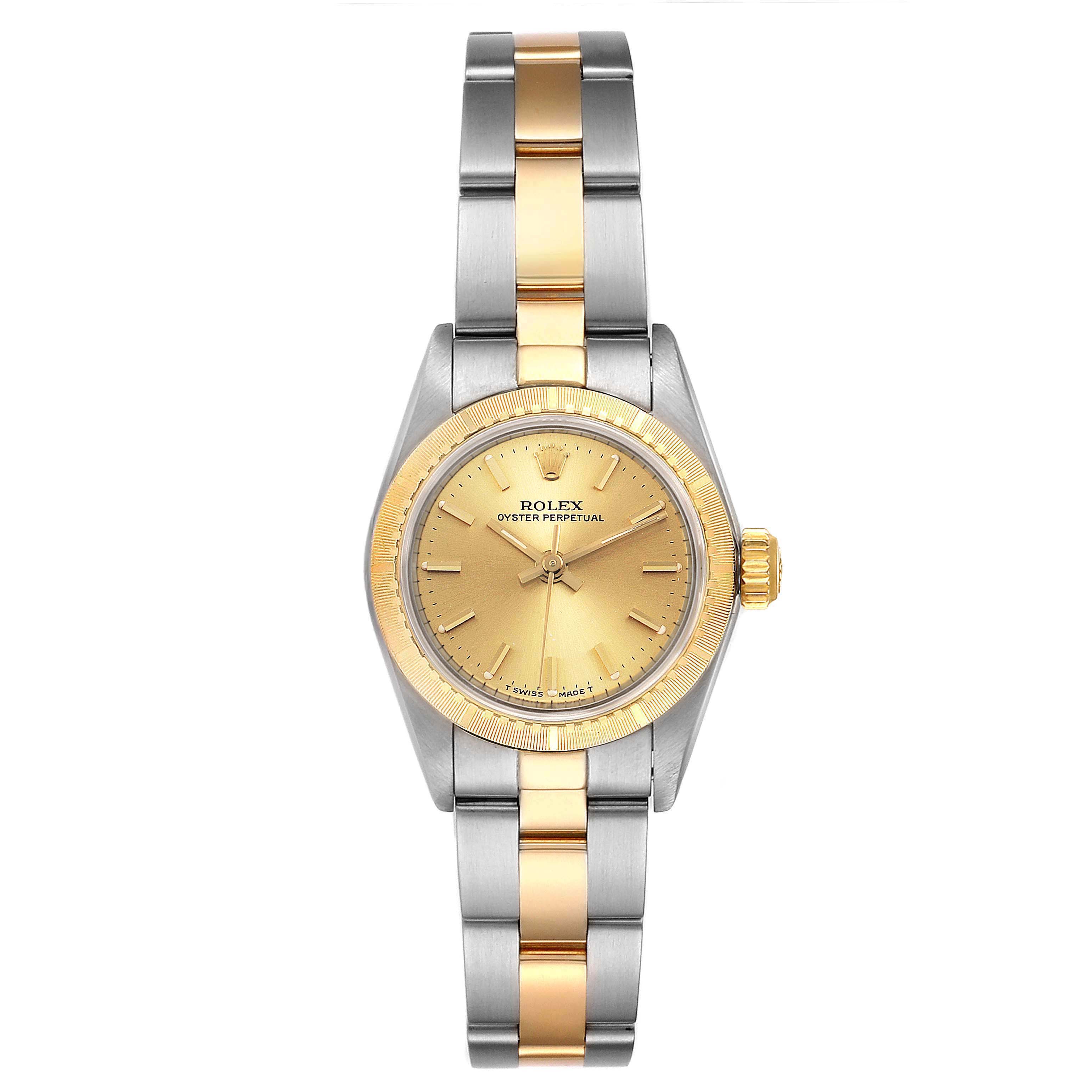 This image shows a front view of a Rolex Oyster Perpetual 67243 Women
s Steel and Gold (two tone) Champagne Dial 67243 Women
s Steel and Gold (two tone) Champagne Dial watch, highlighting its two-tone bracelet and gold dial.