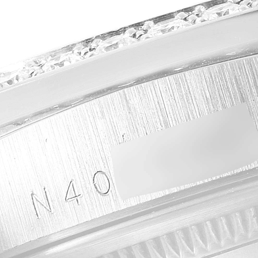 Close-up of the serial number engraved on the case of a Rolex President 18346 Men's Platinum Silver Dial 18346 Men's Platinum Silver Dial model watch.