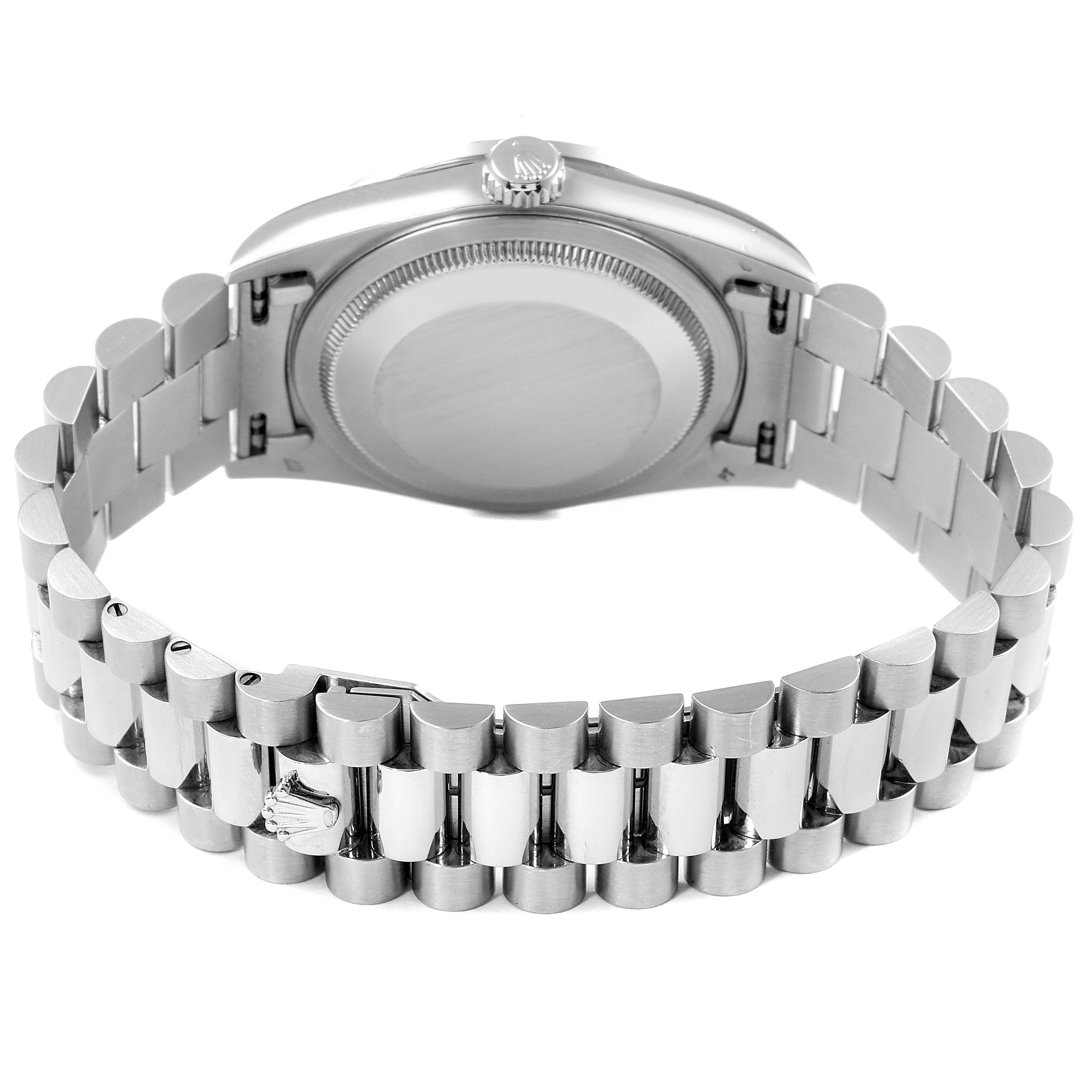 The image shows the backside of a Rolex President 18346 Men's Platinum Silver Dial 18346 Men's Platinum Silver Dial watch, highlighting the case, crown, and bracelet.