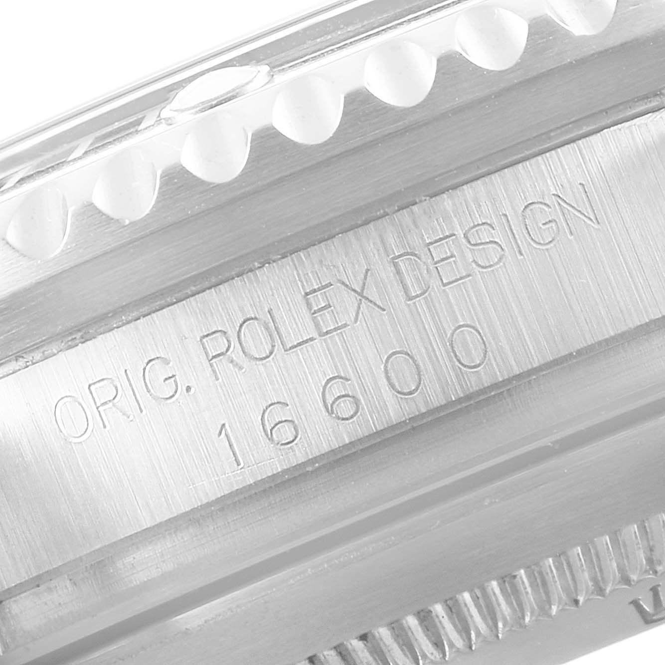 This image shows a close-up of the case side of the Rolex Sea-Dweller 16600 Men
s Stainless Steel Black Dial 16600 Men
s Stainless Steel Black Dial, model 16600, with "ORIG. ROLEX DESIGN" engraved.