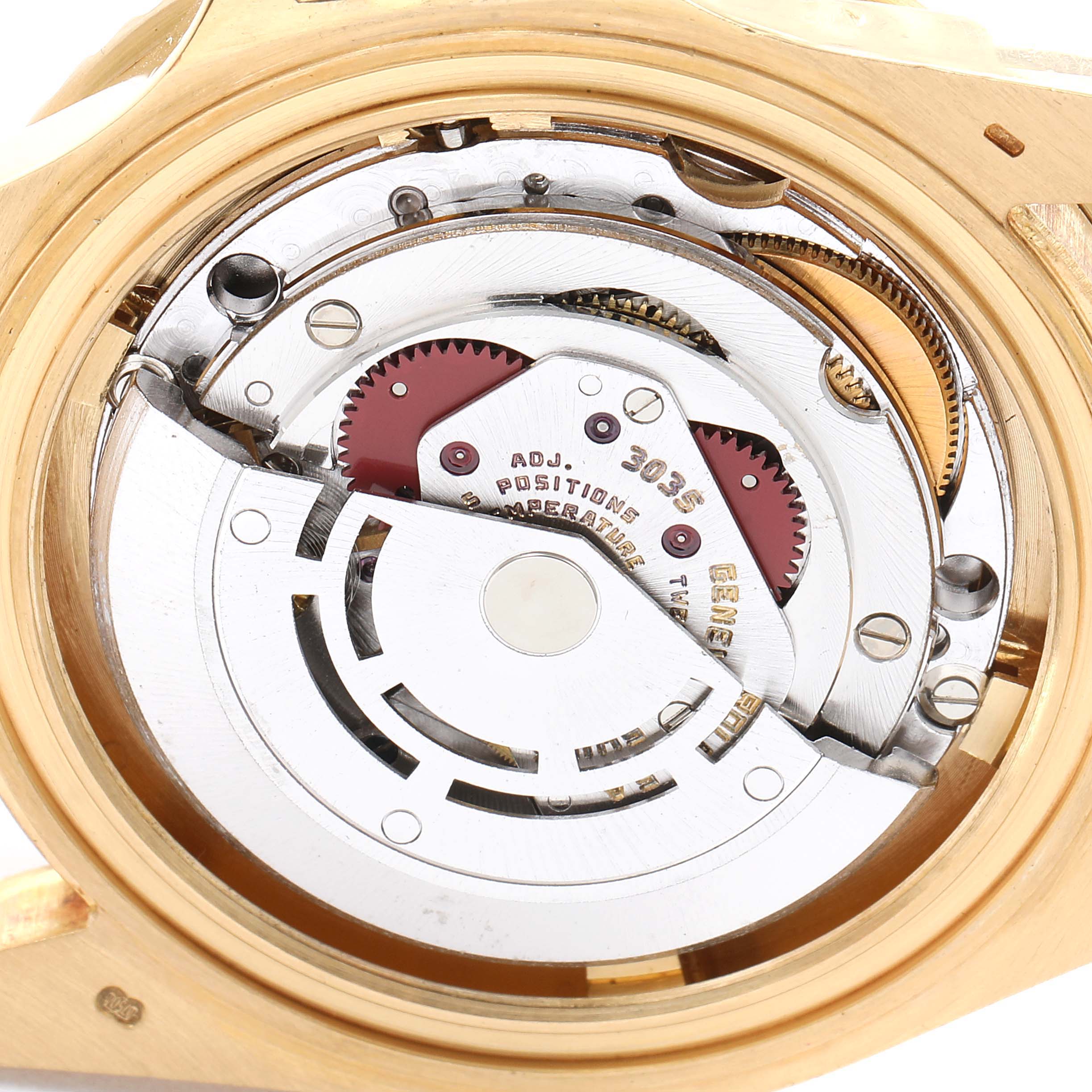 The image shows the inner mechanical movement components of a Rolex Submariner 16808 Men's Yellow Gold Black Dial 16808 Men's Yellow Gold Black Dial watch from the case back angle.