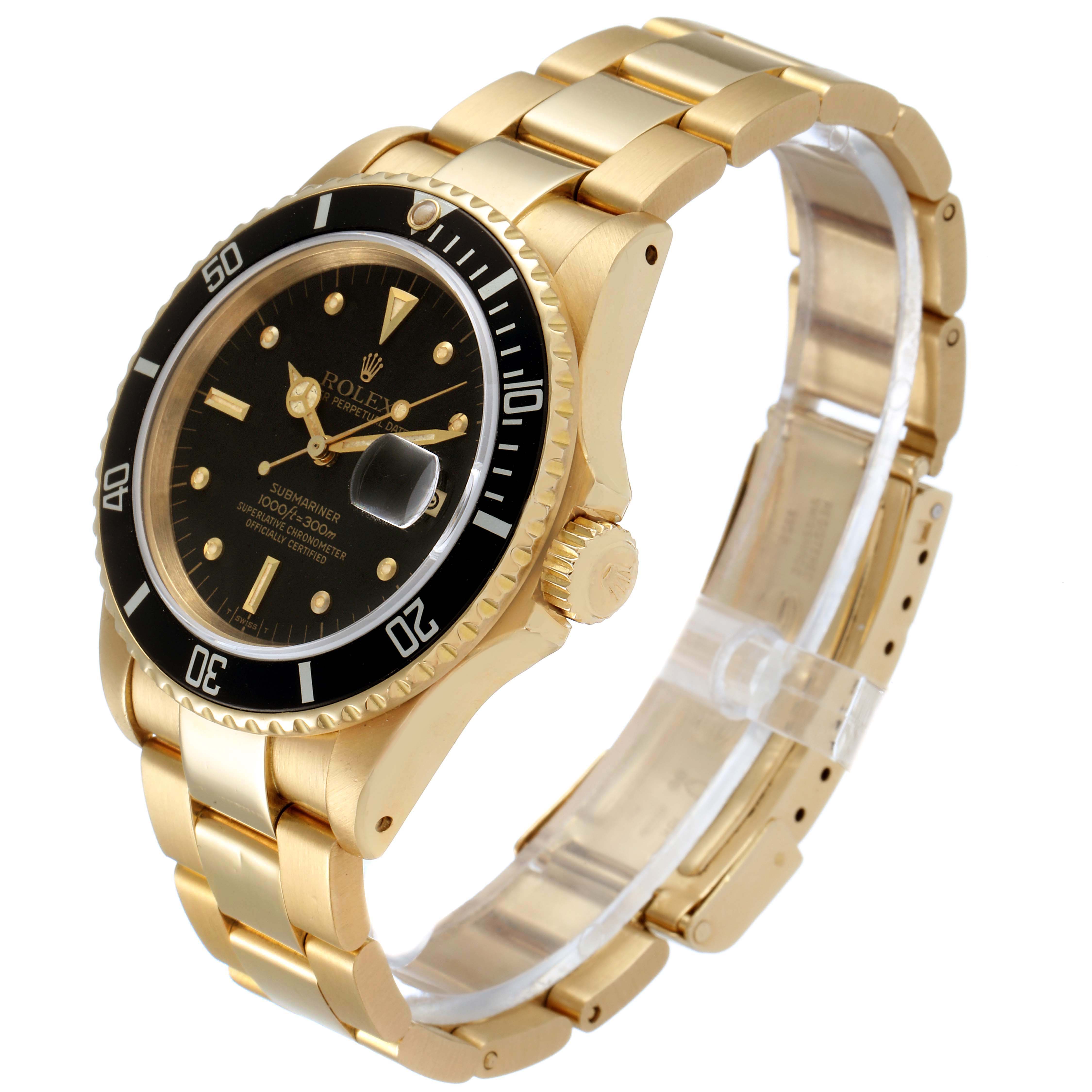 The image shows a side angle of a Rolex Submariner 16808 Men's Yellow Gold Black Dial 16808 Men's Yellow Gold Black Dial watch, highlighting its gold bracelet and black dial.