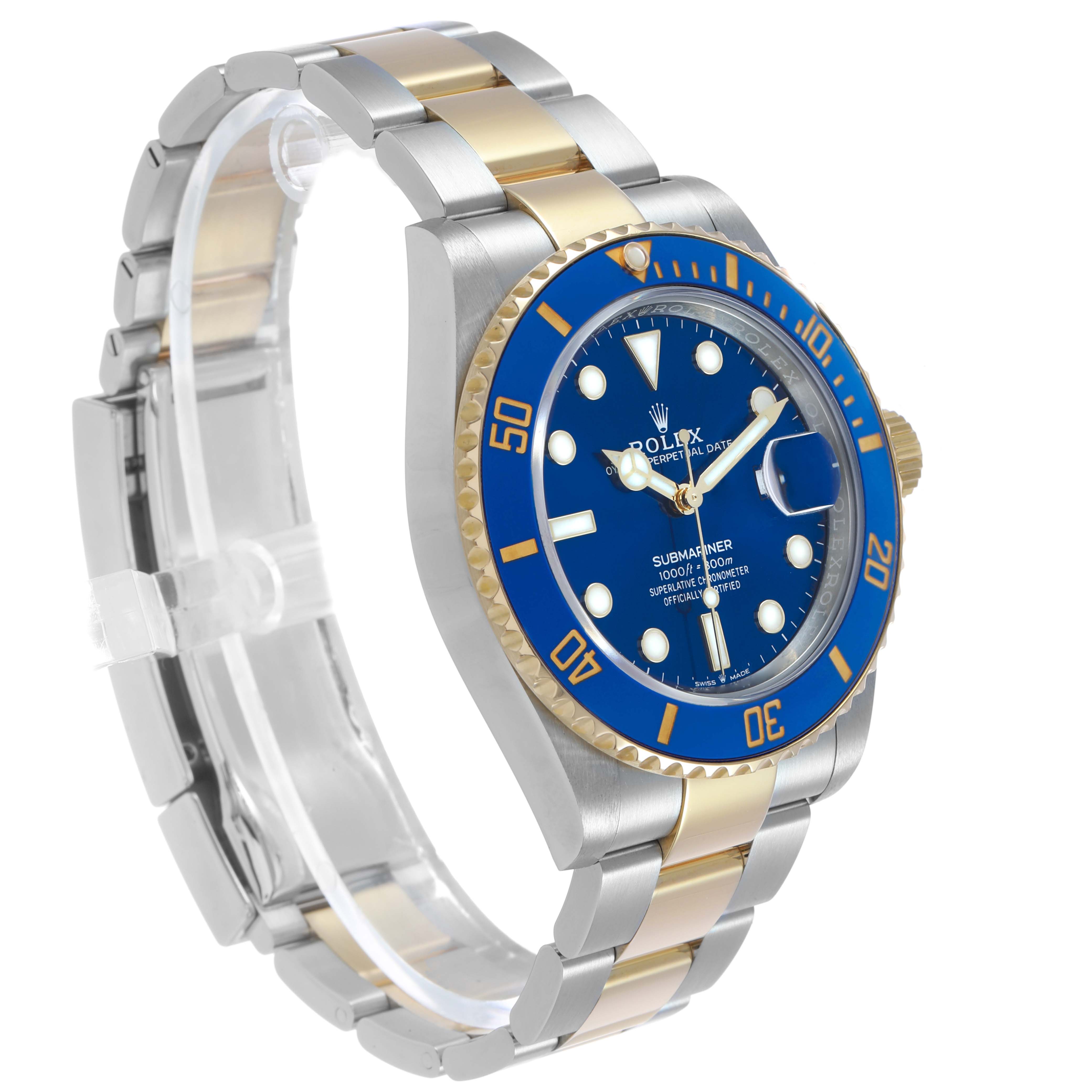 The Rolex Submariner M126613LB-0002 Men's Stainless Steel Blue Dial watch is shown at a three-quarter angle, displaying the blue dial, bezel, and two-tone bracelet.
