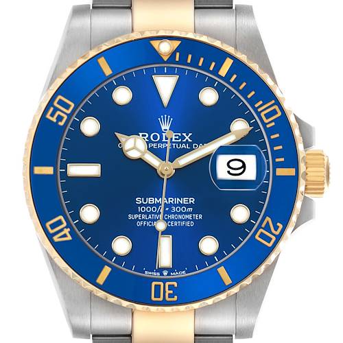 The Rolex Submariner M126613LB-0002 Men's Stainless Steel Blue Dial watch is shown from a front angle, highlighting its blue dial, gold hour markers, and date window.
