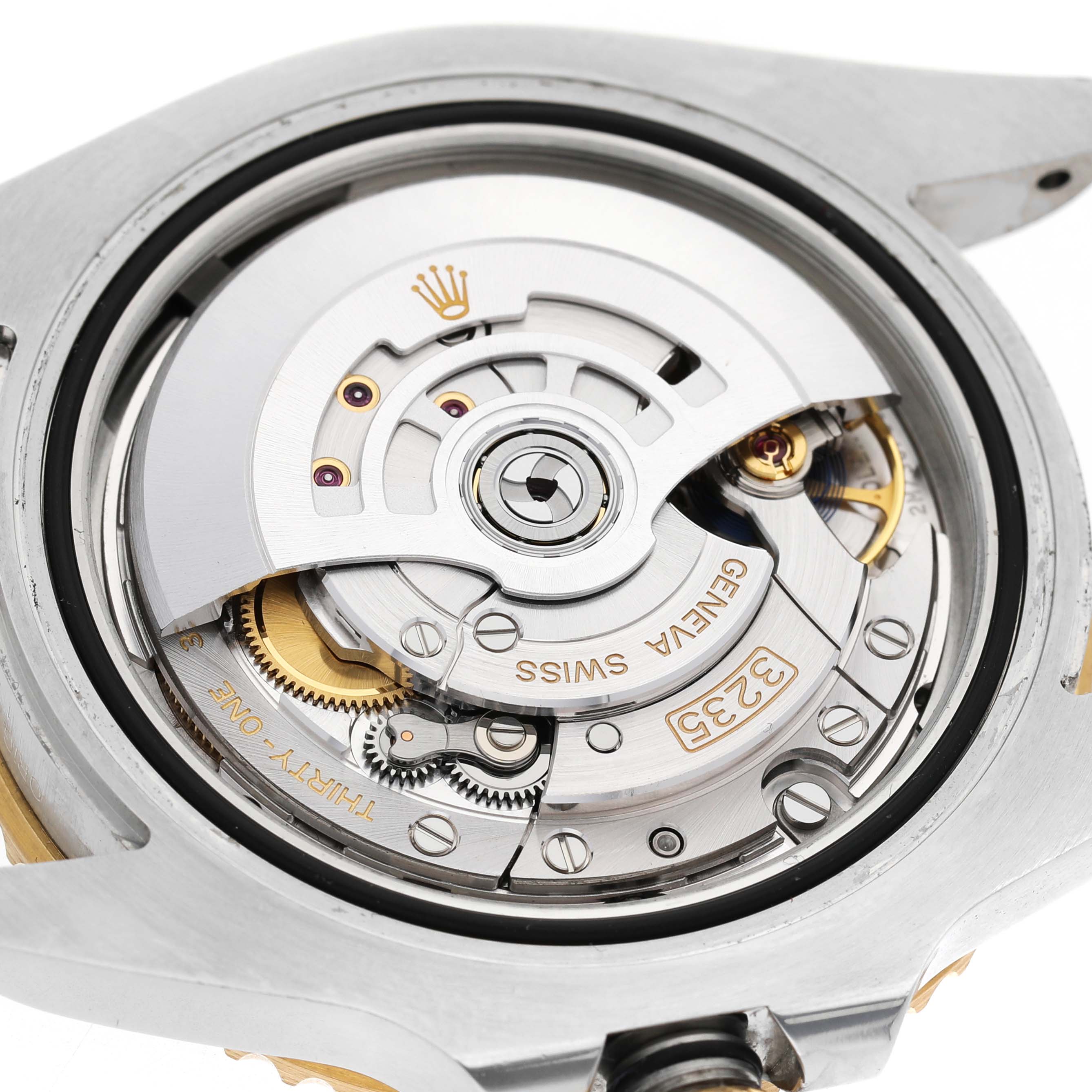 The image shows the movement and rotor of a Rolex Submariner M126613LB-0002 Men's Stainless Steel Blue Dial watch from the back.