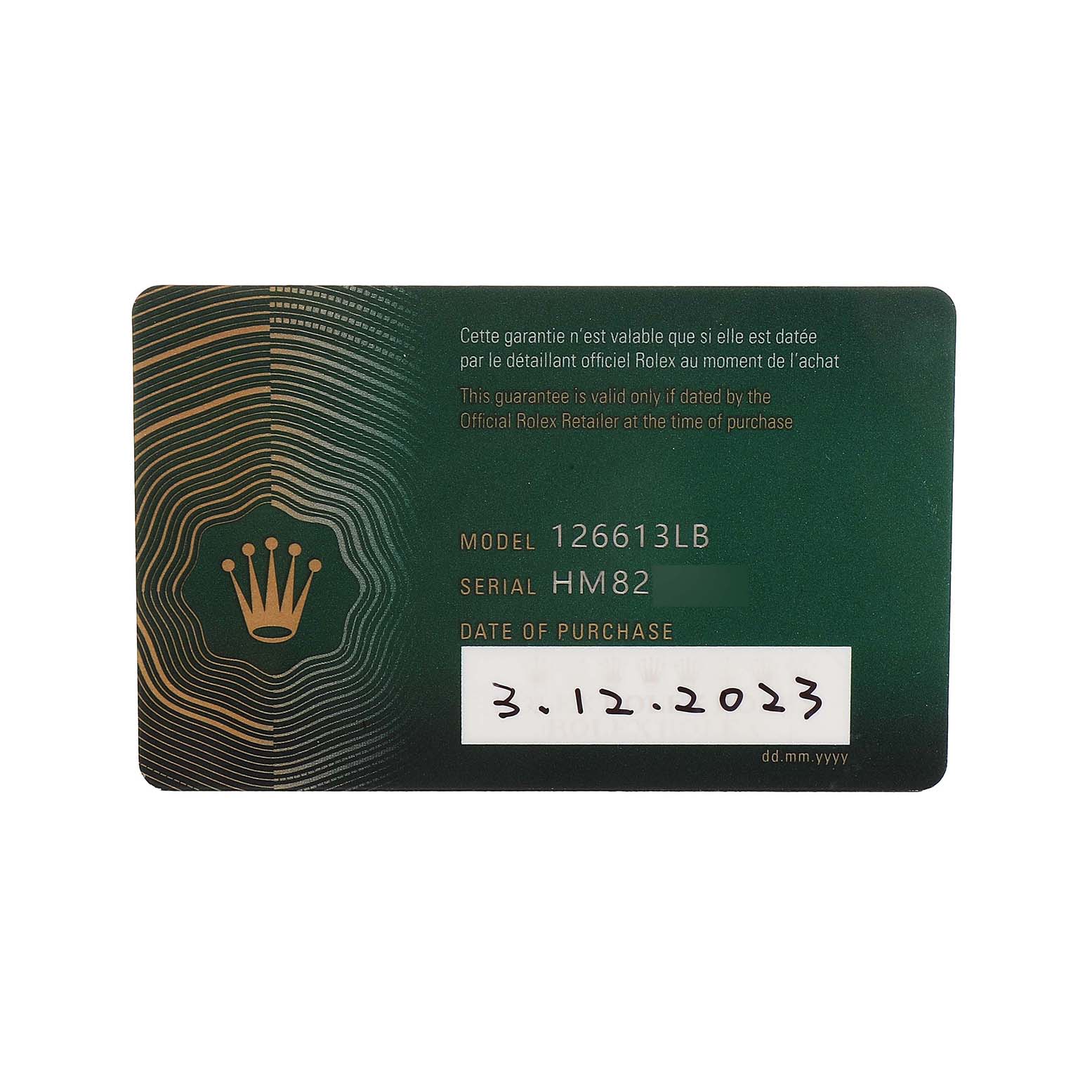 This image shows a Rolex warranty card for the Submariner model, displaying model number, serial number, and purchase date.
