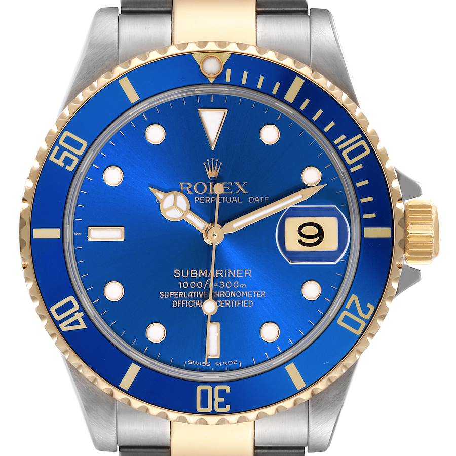 The Rolex Submariner is shown from the front, displaying its blue dial, bezel, hour markers, hands, and date window.