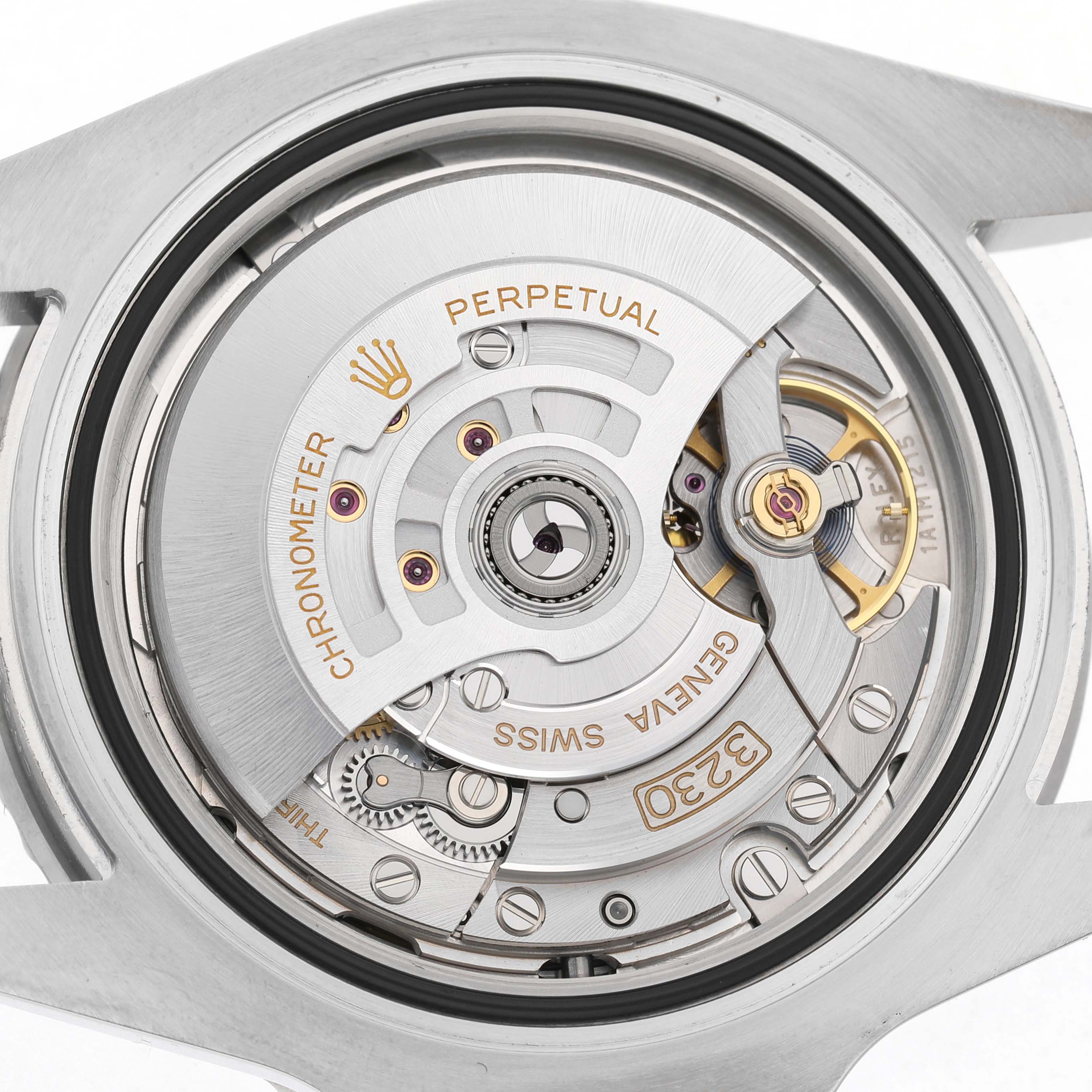 The image shows the open case back view of a Rolex Submariner M124060-0001 Men's Stainless Steel Black Dial, highlighting its intricate movement and rotor.